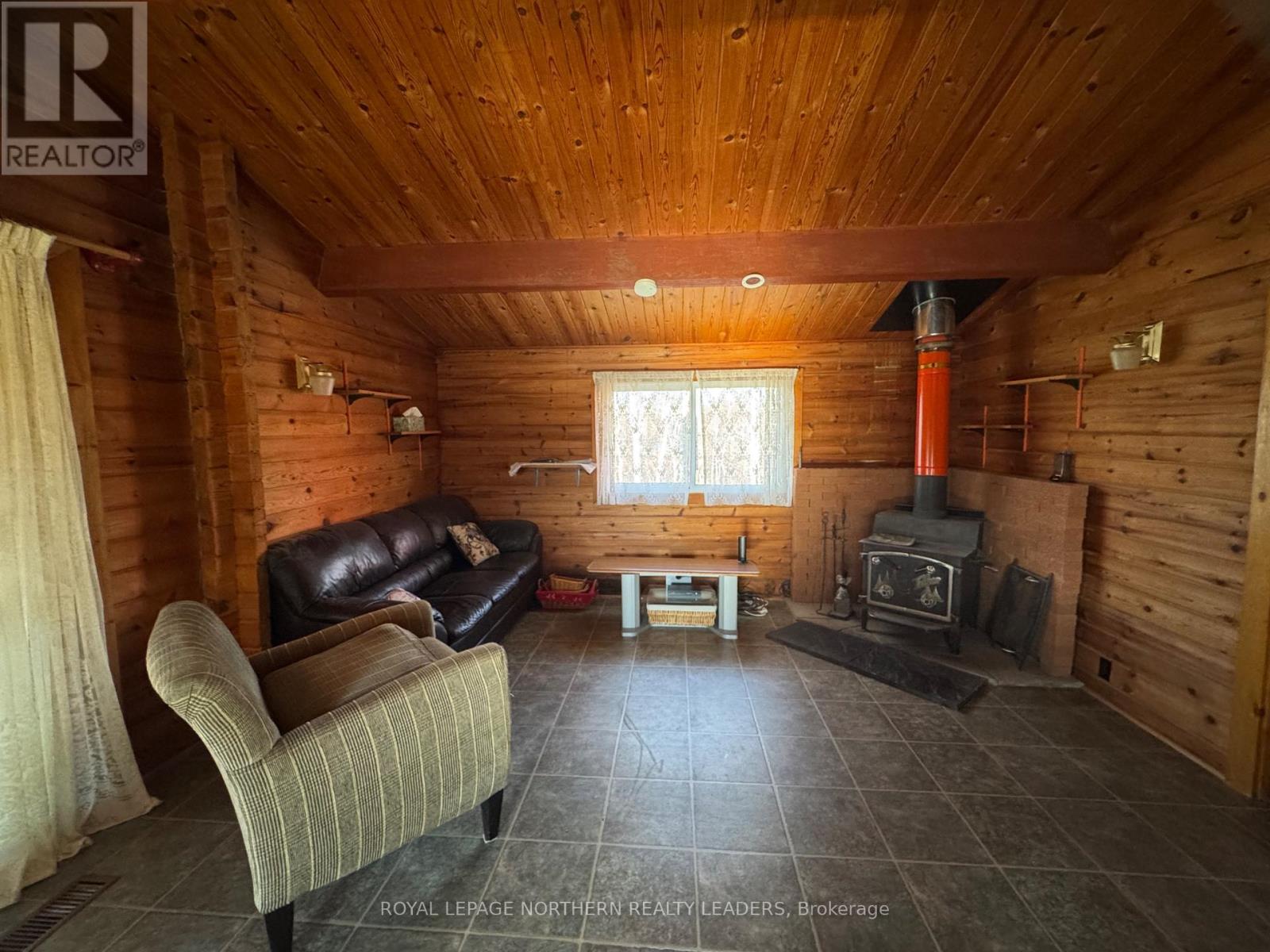 Lot 25 Munro Twp, Black River-Matheson (Matheson), ON - Indoor With Fireplace