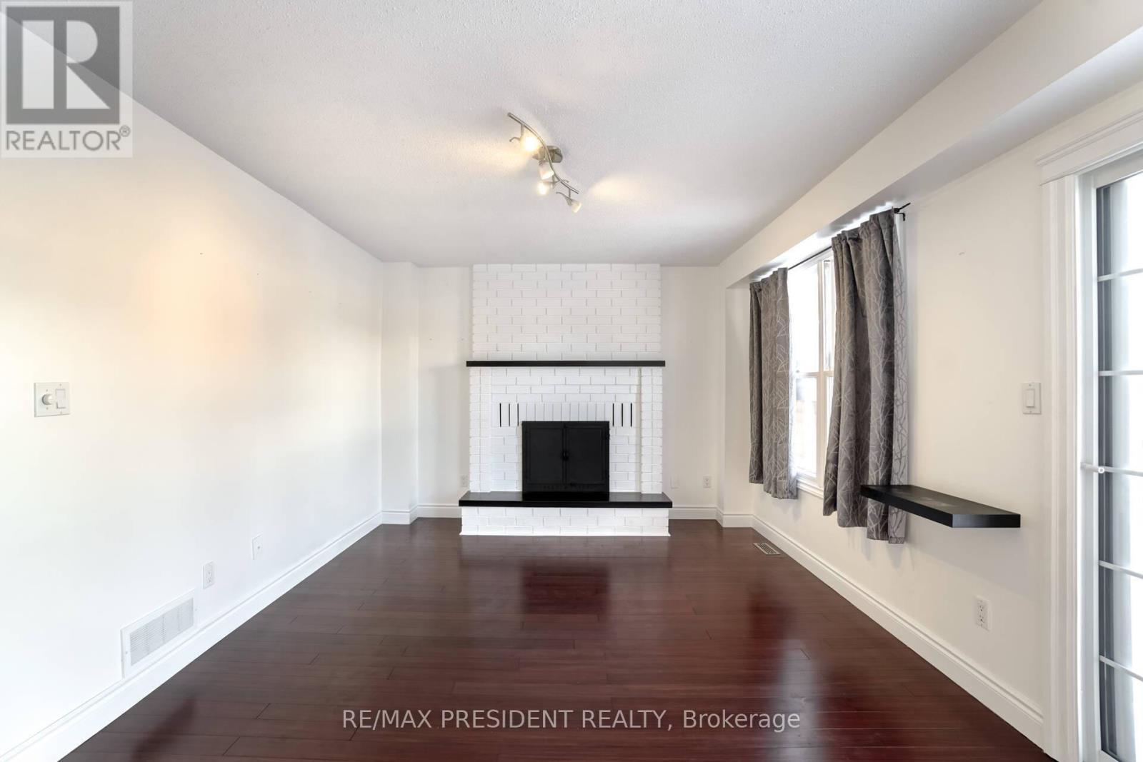 2 White Cliffe Drive, Clarington, ON - Indoor With Fireplace