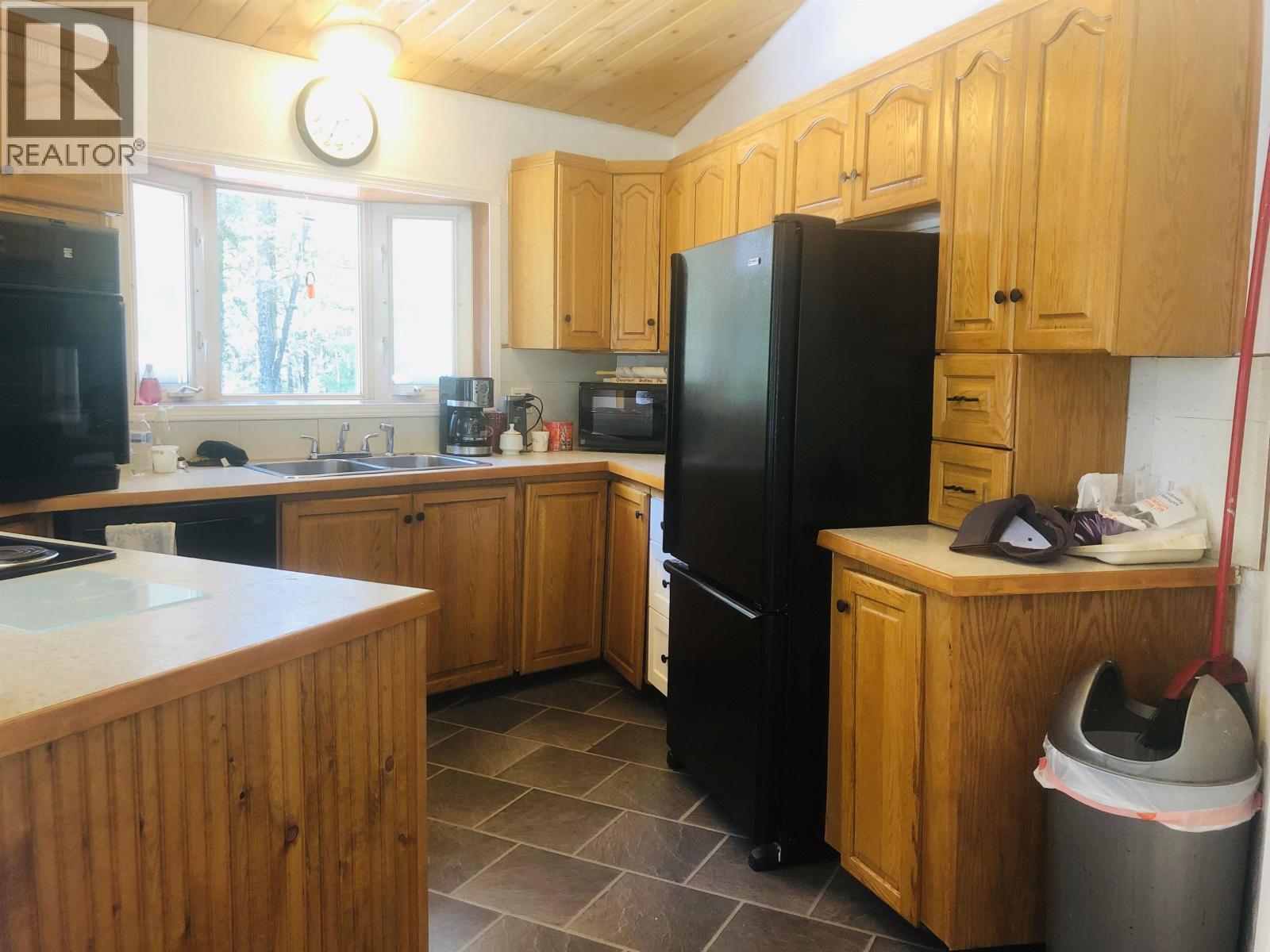 3024 Keldon Road, Lac La Hache, BC - Indoor Photo Showing Kitchen With Double Sink