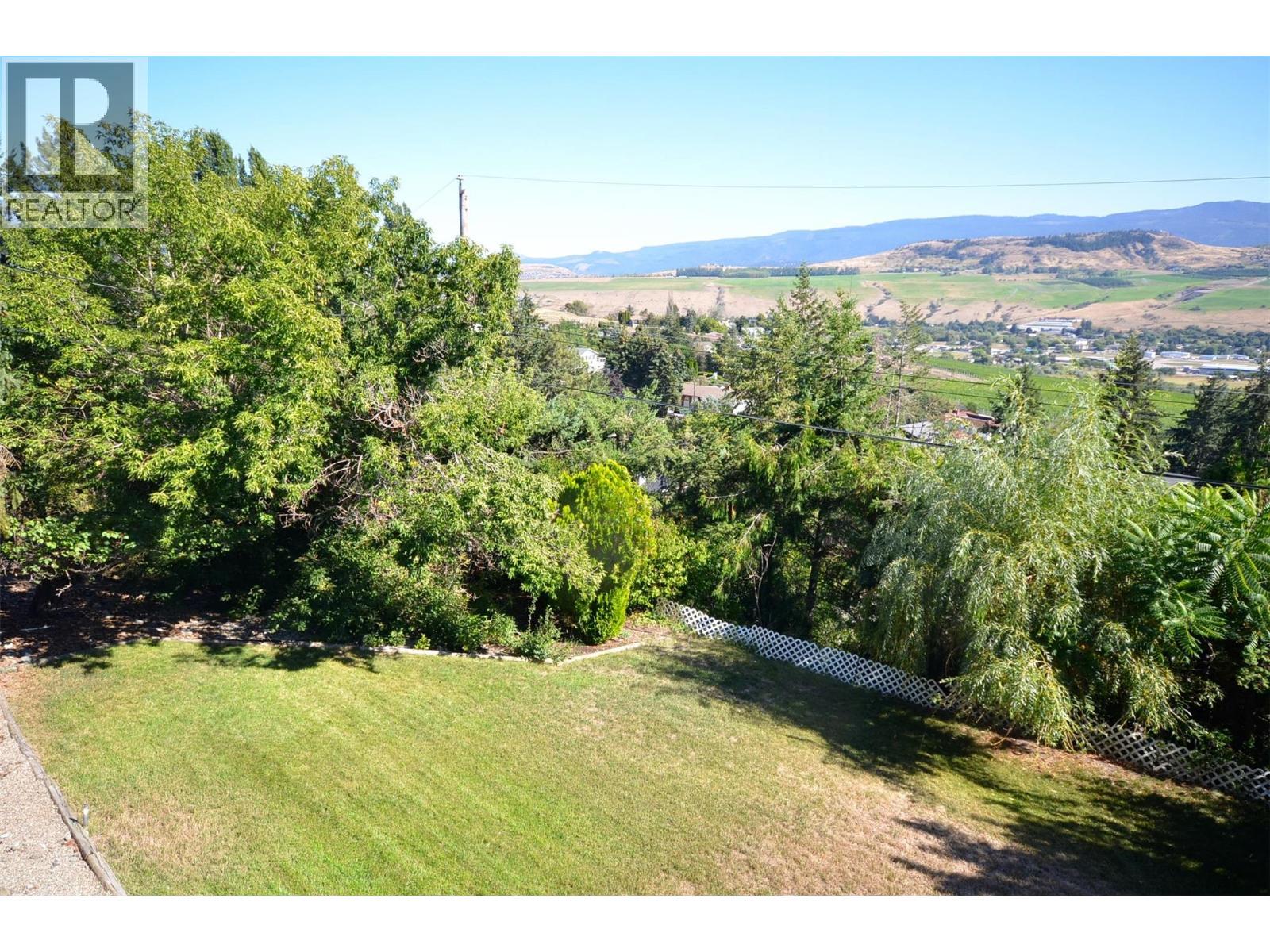 Look down at the back yard - 6609 Southwind Road, Vernon, BC - Outdoor With View