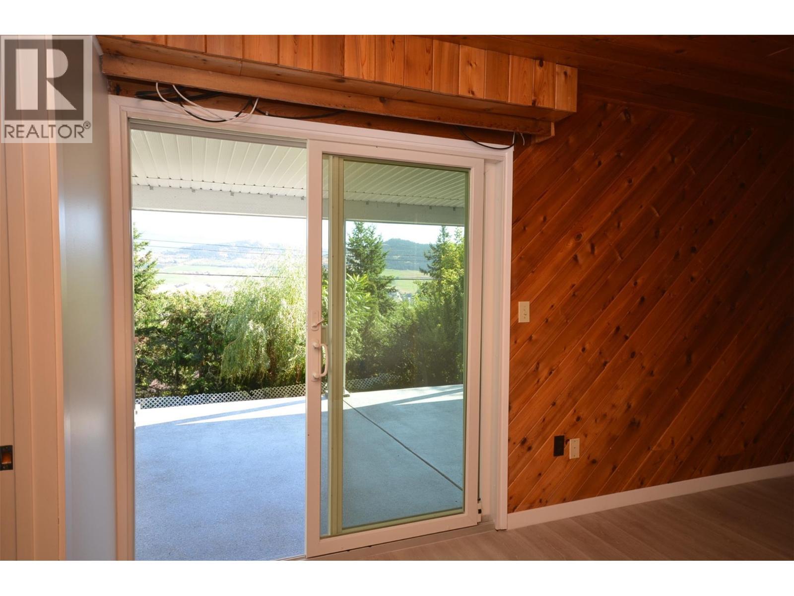 Amazing quality sliding doors - 6609 Southwind Road, Vernon, BC - Photo Showing Other Room