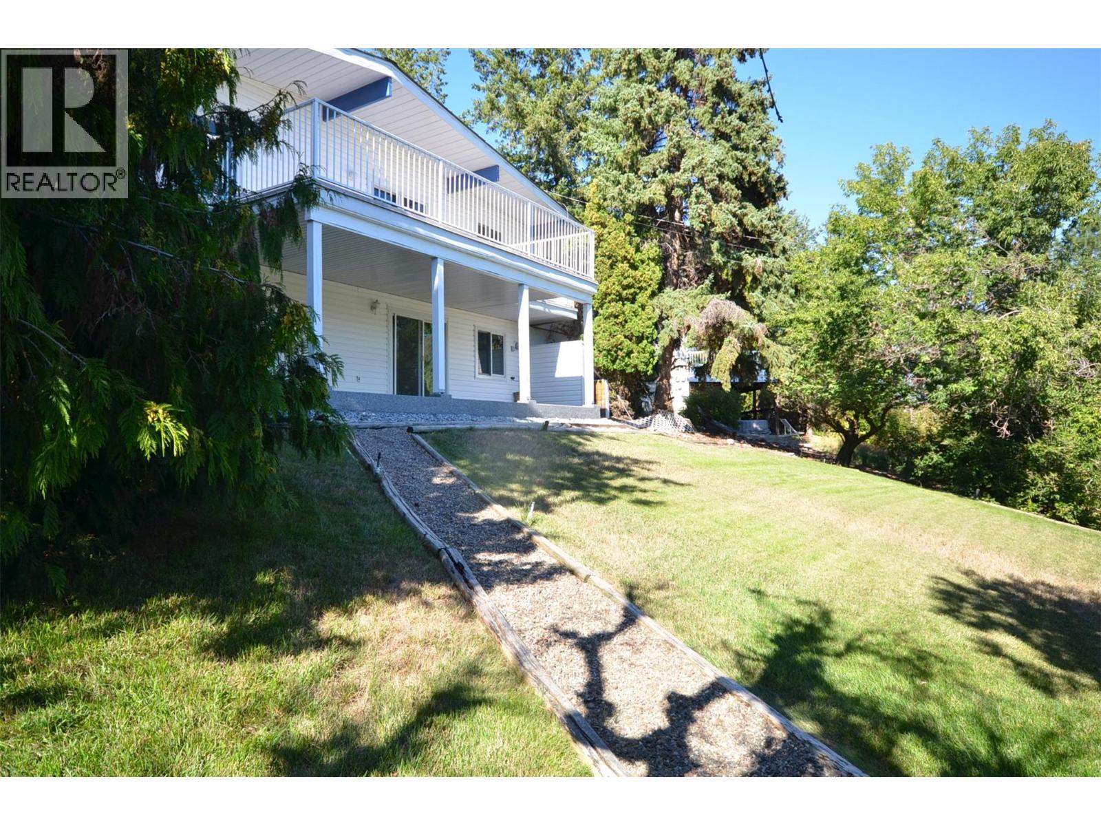 Back yard - 6609 Southwind Road, Vernon, BC - Outdoor With Balcony With Deck Patio Veranda