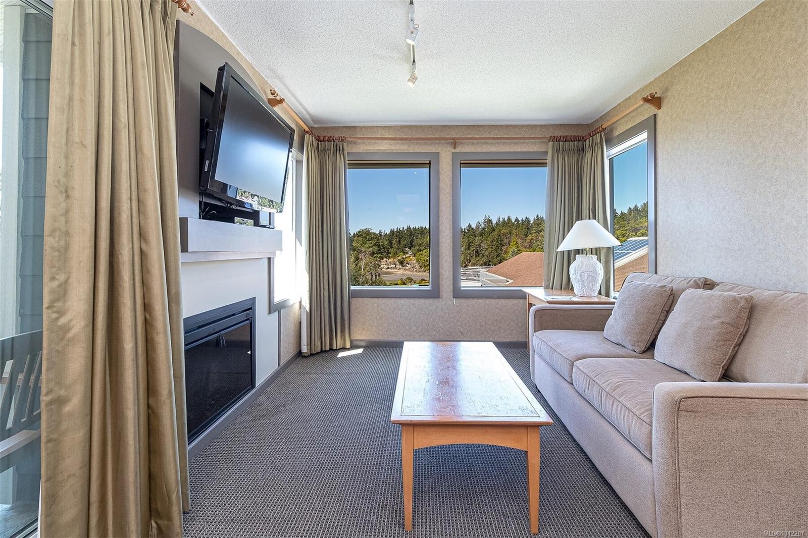 736-1600 Stroulger Rd, Nanoose Bay, BC - Indoor Photo Showing Living Room With Fireplace