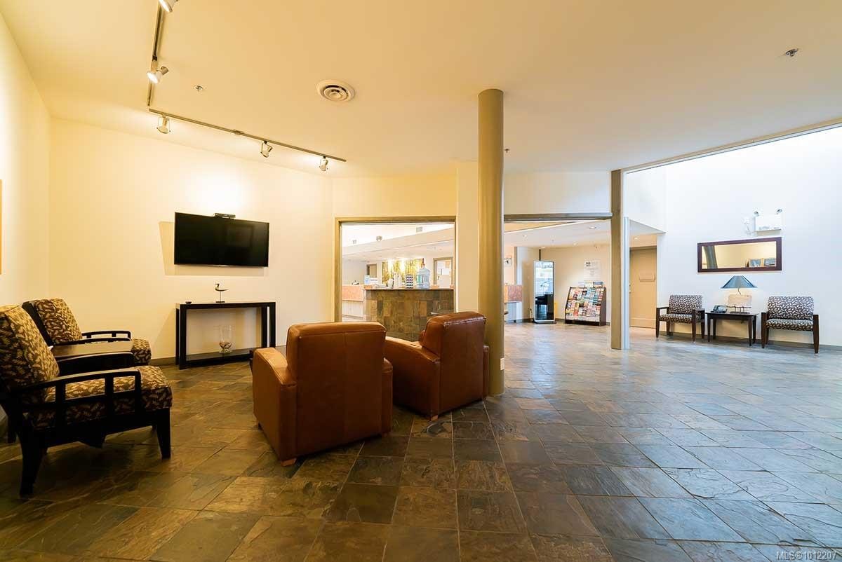 736-1600 Stroulger Rd, Nanoose Bay, BC - Indoor Photo Showing Living Room With Fireplace