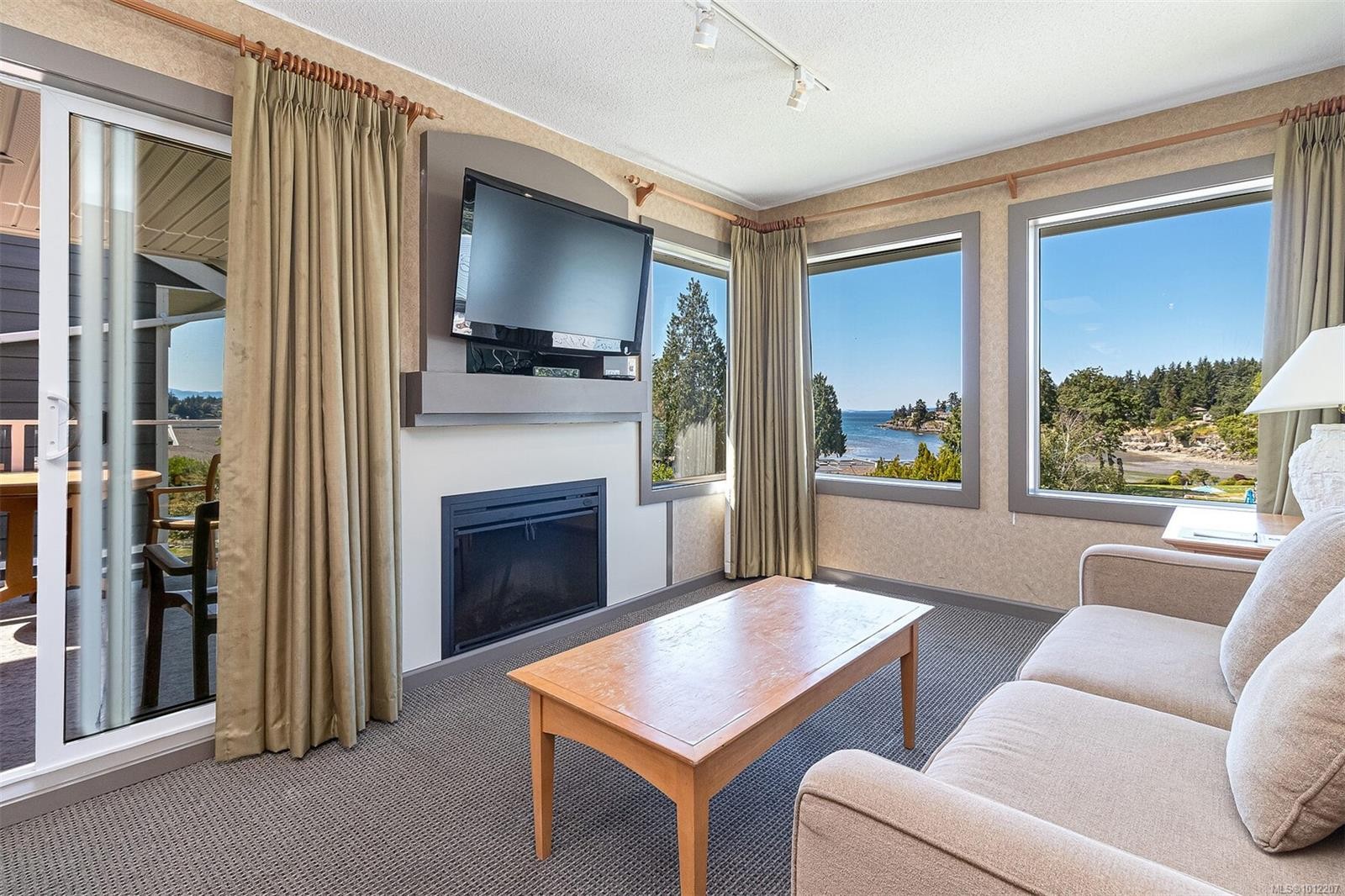 736-1600 Stroulger Rd, Nanoose Bay, BC - Indoor Photo Showing Living Room With Fireplace