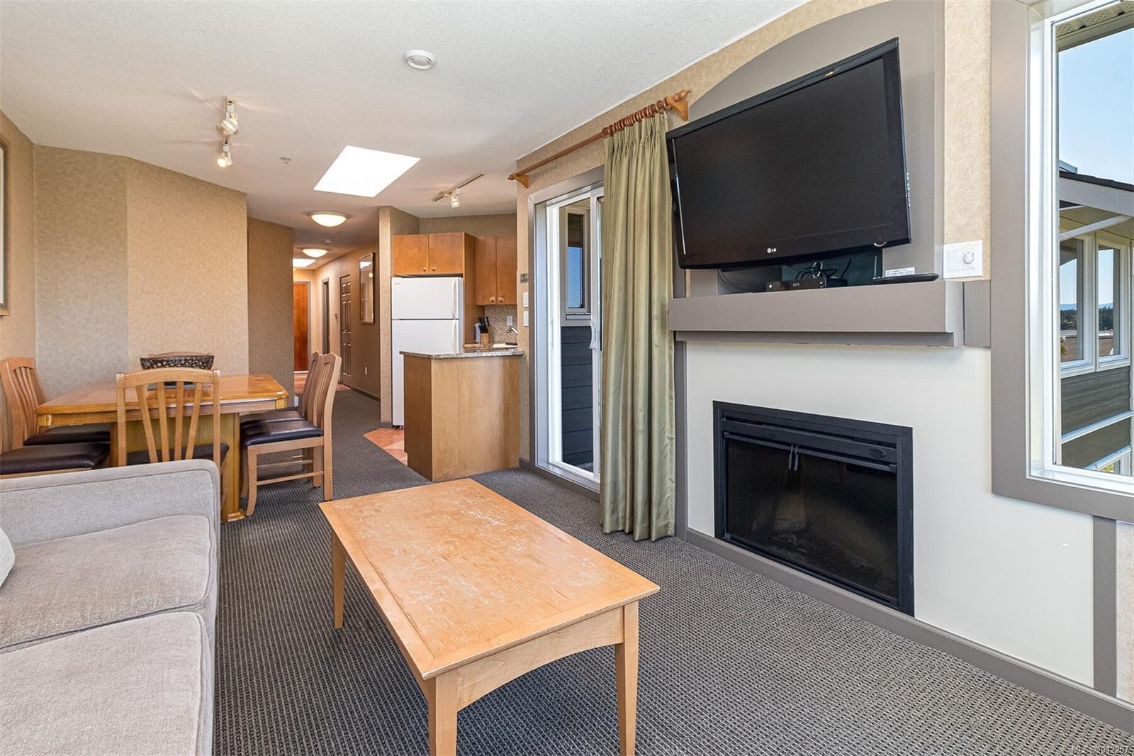 736-1600 Stroulger Rd, Nanoose Bay, BC - Indoor Photo Showing Living Room With Fireplace