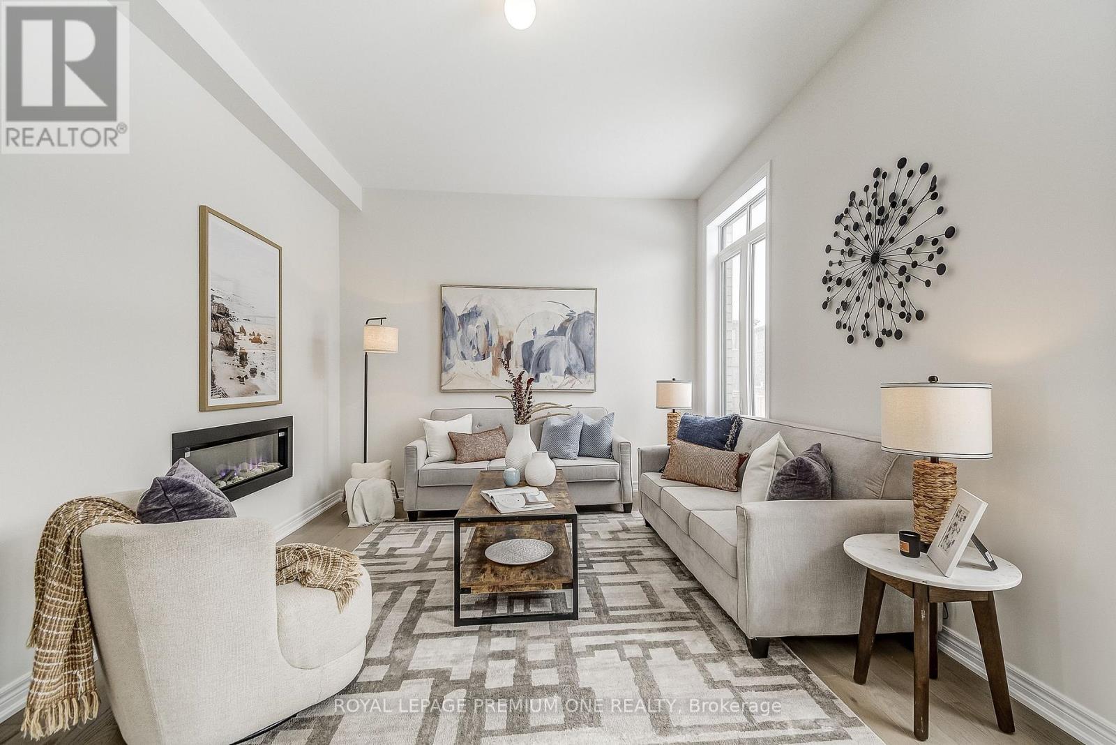 884 Plum Place, Milton, ON - Indoor Photo Showing Living Room With Fireplace