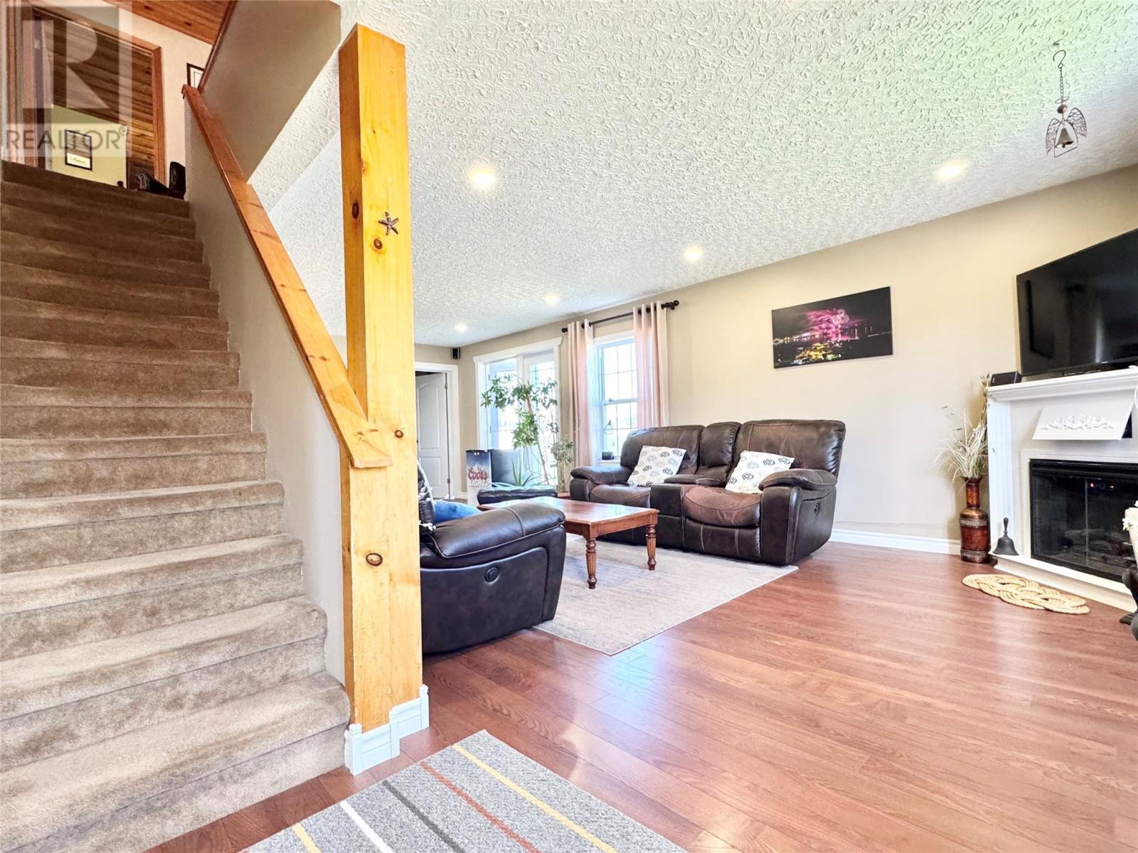 40 Main Street, Twillingate, NL - Indoor Photo Showing Living Room With Fireplace