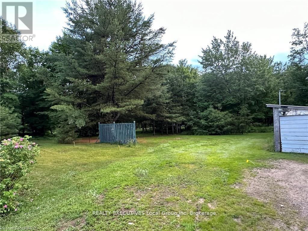 4319 Highway 11 N, North Bay (College Heights), ON - Outdoor With Backyard