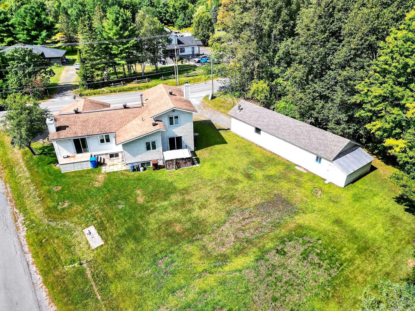 Aerial photo - 824 Ch. De L'Achigan E., Sainte-Sophie, QC - Outdoor