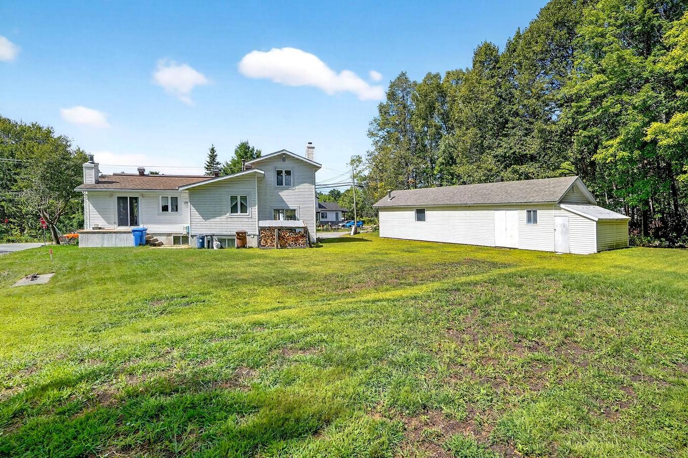 Backyard - 824 Ch. De L'Achigan E., Sainte-Sophie, QC - Outdoor With Exterior