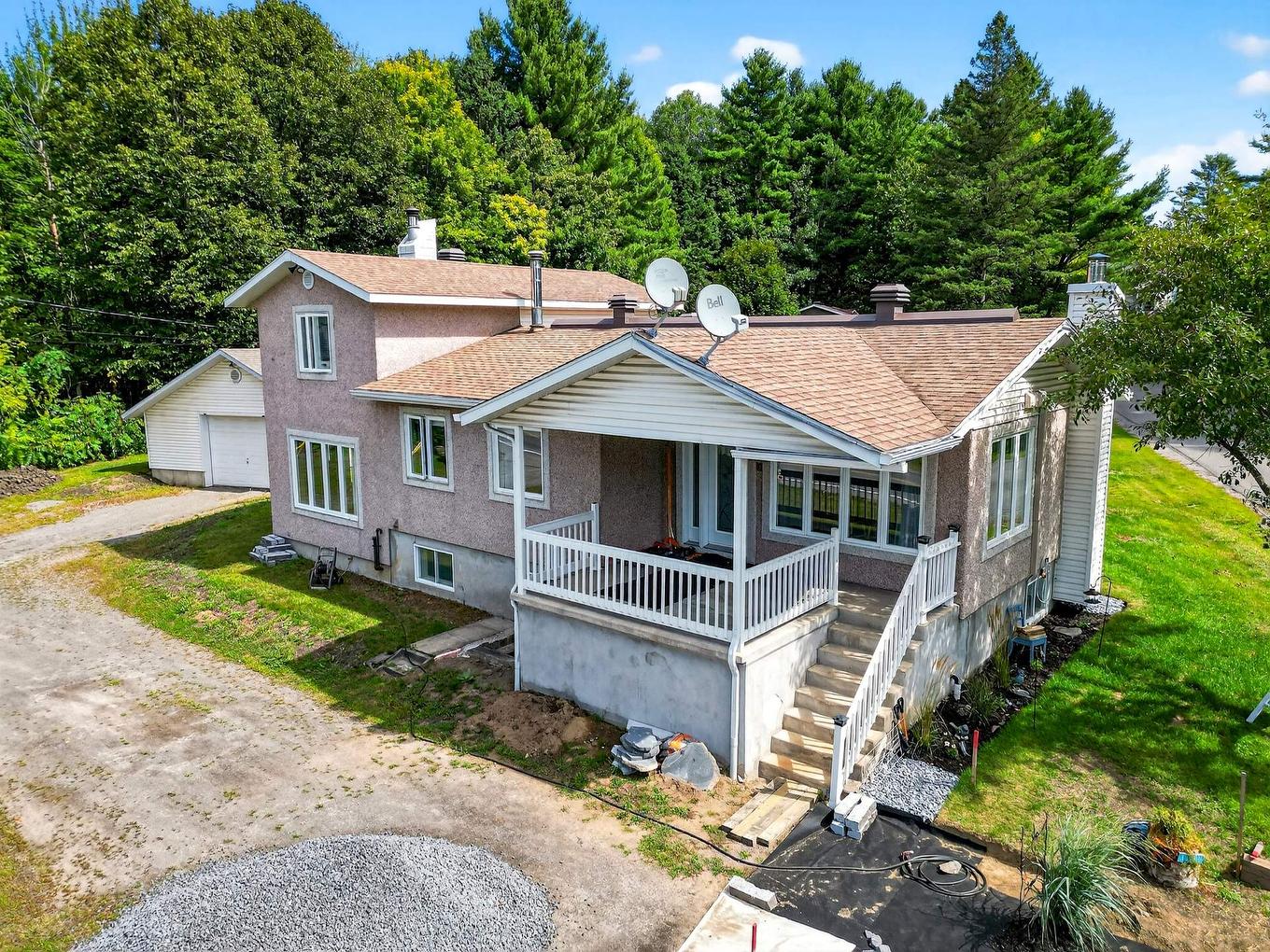 Aerial photo - 824 Ch. De L'Achigan E., Sainte-Sophie, QC - Outdoor With Deck Patio Veranda