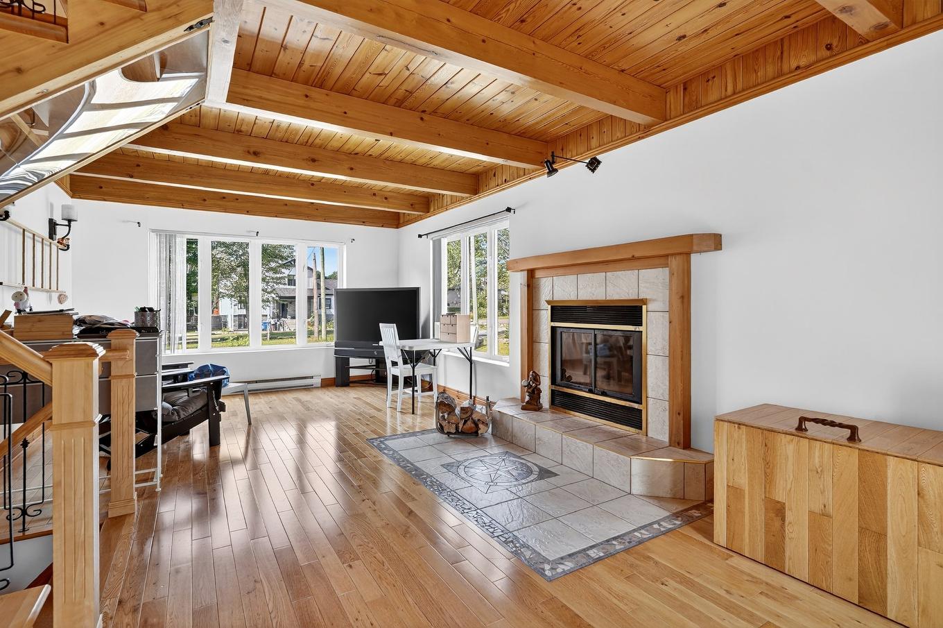 Living room - 824 Ch. De L'Achigan E., Sainte-Sophie, QC - Indoor With Fireplace