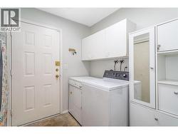 Main floor laundry and access to garage. -
