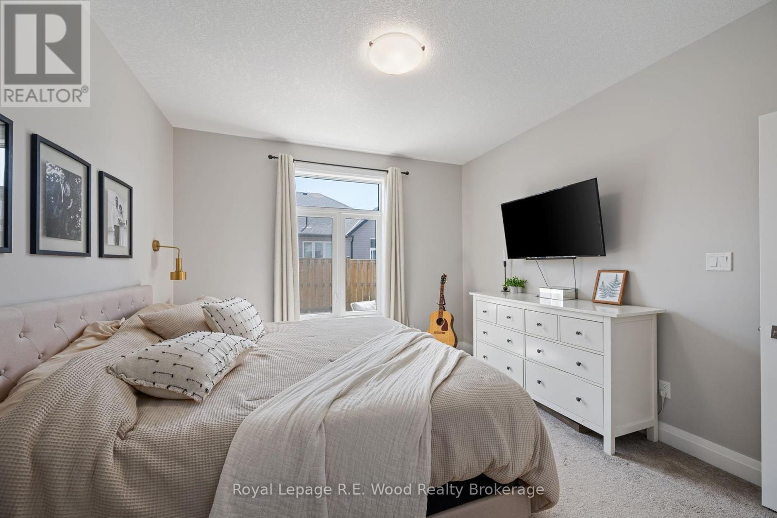 32 - 63 Compass Trail, Central Elgin, ON - Indoor Photo Showing Bedroom