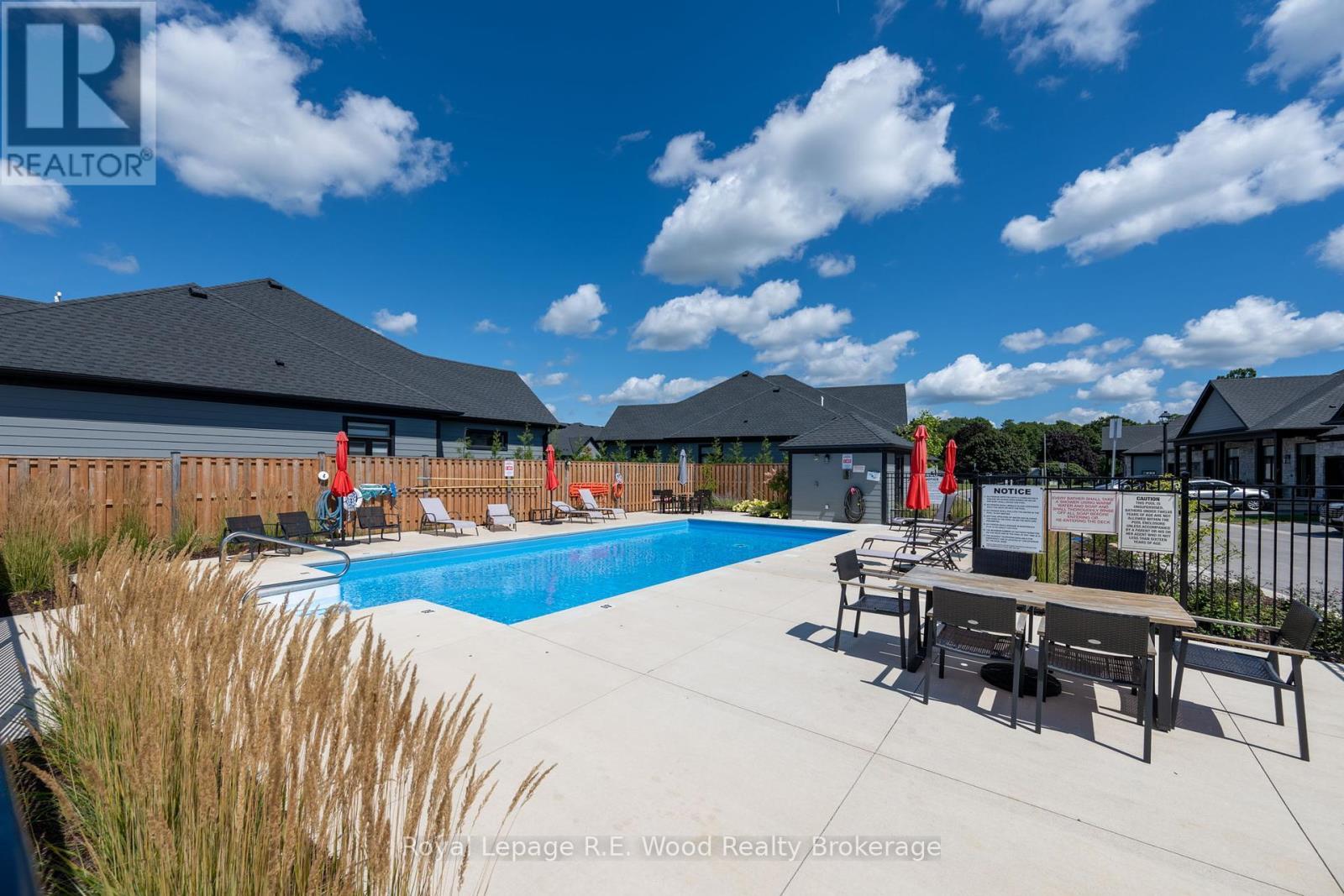 32 - 63 Compass Trail, Central Elgin, ON - Outdoor With In Ground Pool