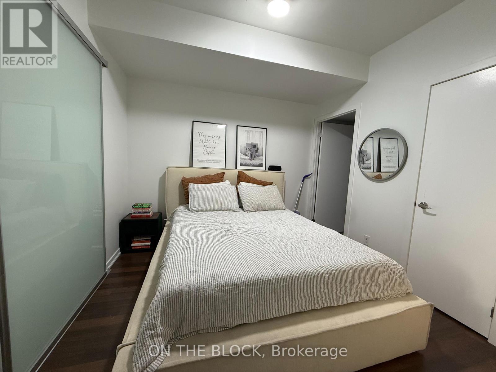 Bedroom - 302 - 38 Joe Shuster Way, Toronto, ON - Indoor Photo Showing Bedroom