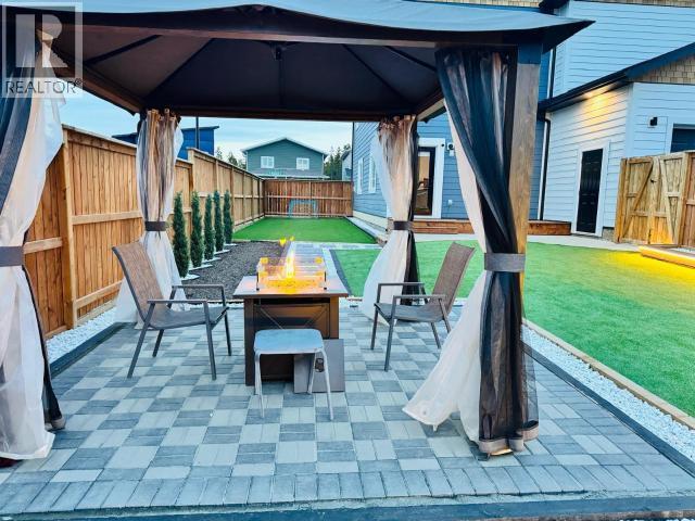 212 Neecheah Street, Whitehorse, YT - Outdoor With Deck Patio Veranda With Exterior