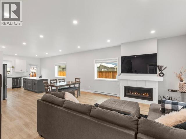 212 Neecheah Street, Whitehorse, YT - Indoor Photo Showing Living Room With Fireplace