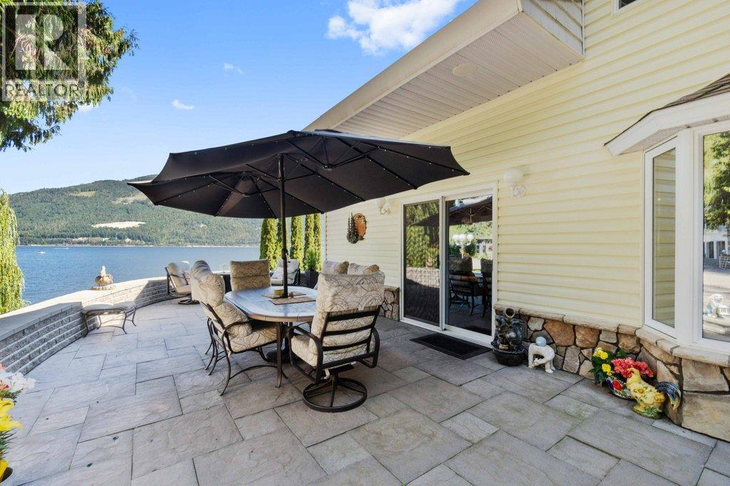 4842 Sunnybrae Canoe Point Road, Tappen, BC - Outdoor With Body Of Water With Deck Patio Veranda With Exterior
