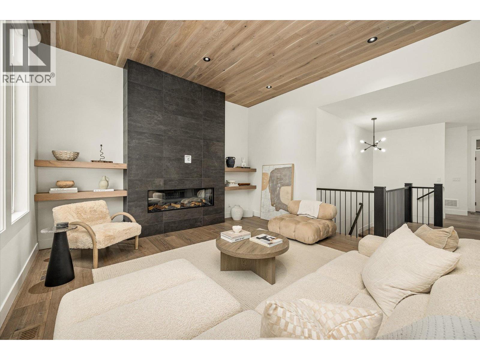 1437 April Springs Court, Kelowna, BC - Indoor Photo Showing Living Room With Fireplace