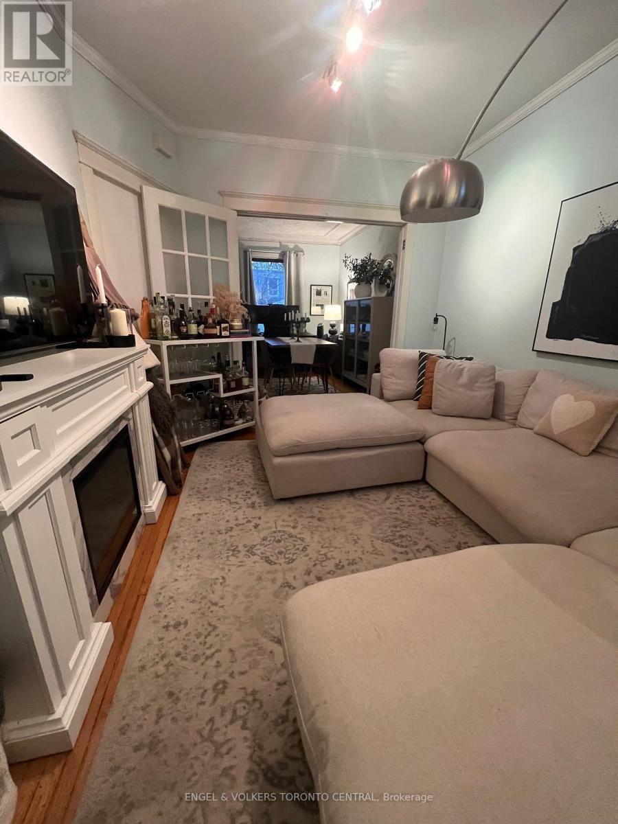 591 Pape Avenue, Toronto, ON - Indoor Photo Showing Other Room With Fireplace