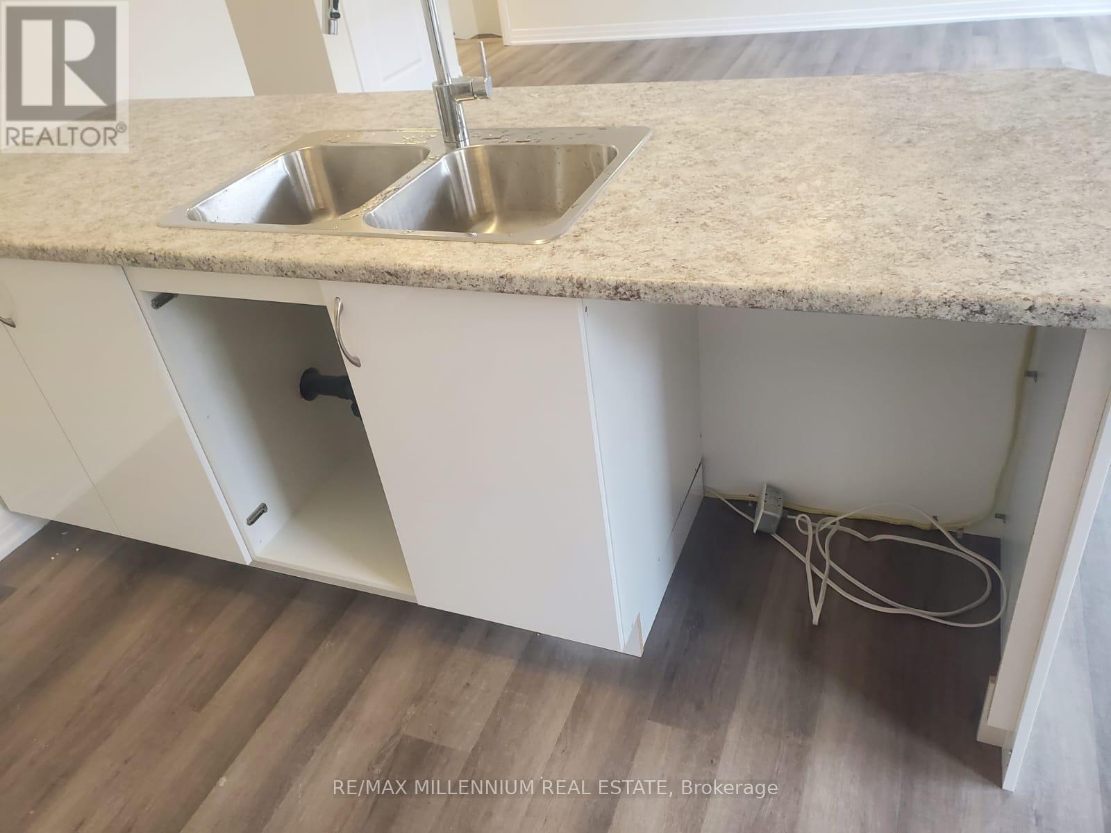 21 - 45 Fieldridge Crescent, Brampton, ON - Indoor Photo Showing Kitchen With Double Sink