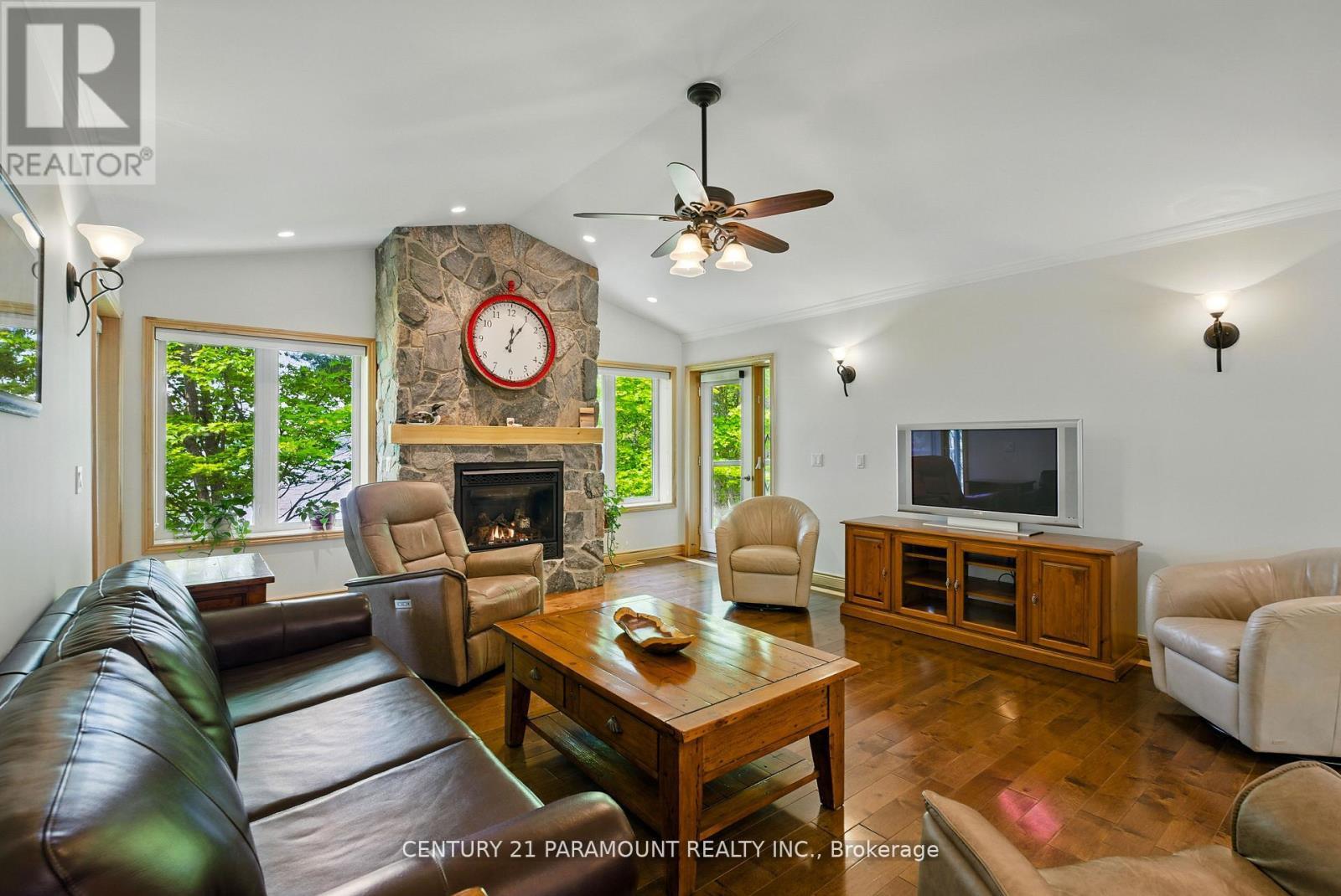 276 Jeffrey Road N, Ryerson, ON - Indoor Photo Showing Living Room With Fireplace