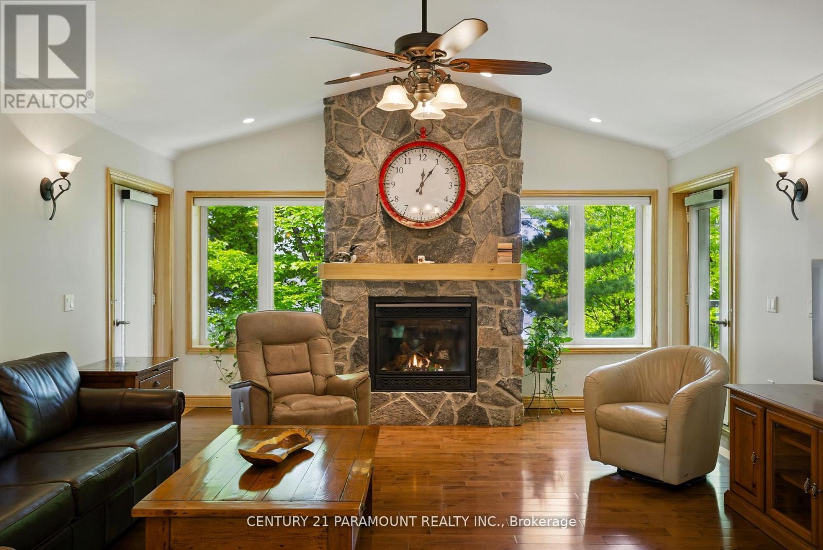 276 Jeffrey Road N, Ryerson, ON - Indoor Photo Showing Living Room With Fireplace