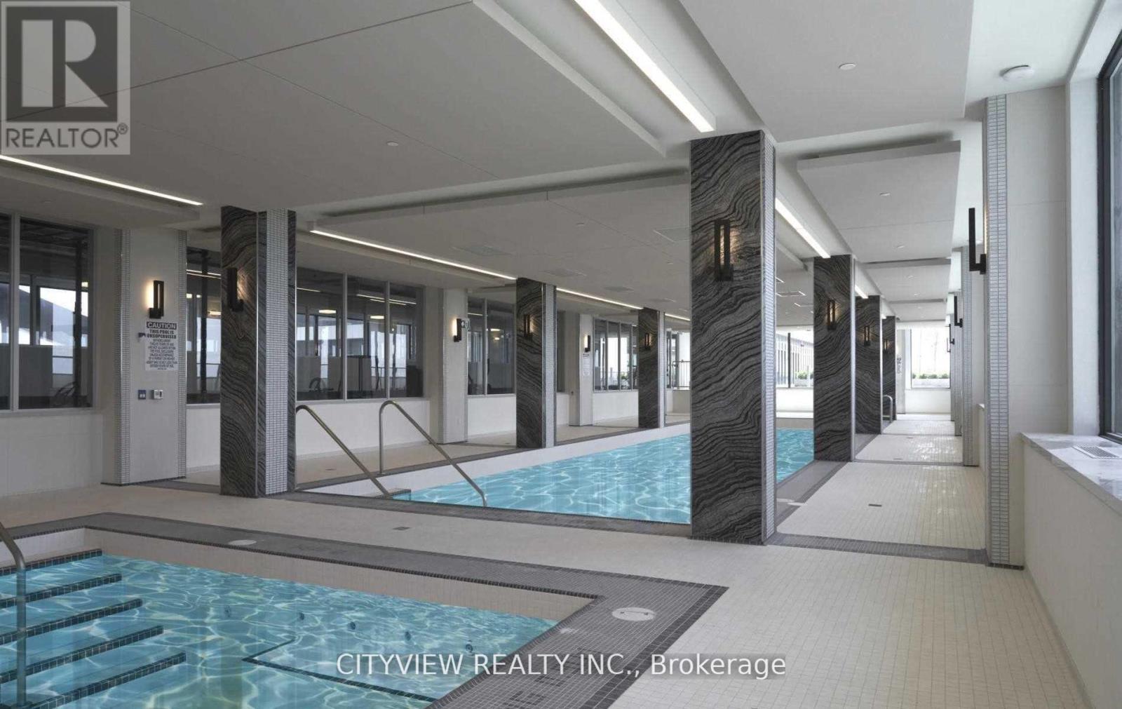 3908 - 20 Shore Breeze Drive, Toronto, ON - Photo Showing Other Room With In Ground Pool