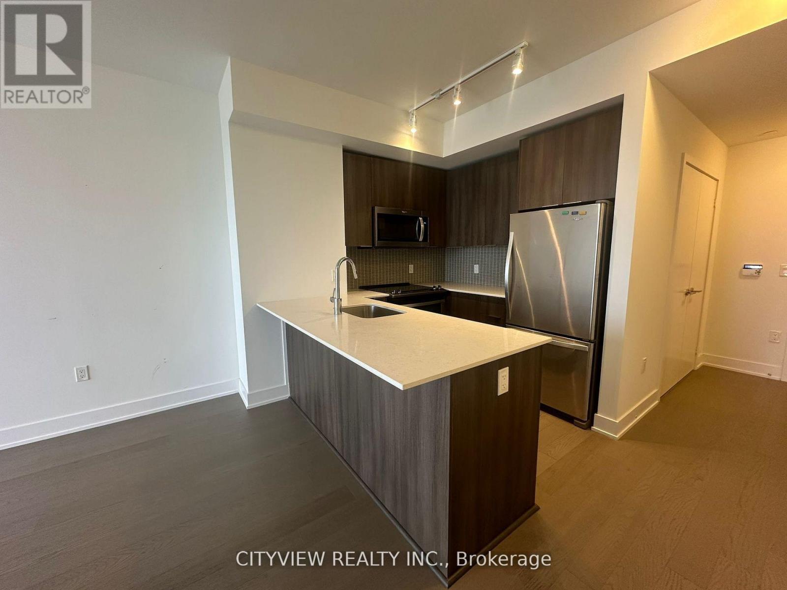 3908 - 20 Shore Breeze Drive, Toronto, ON - Indoor Photo Showing Kitchen With Stainless Steel Kitchen