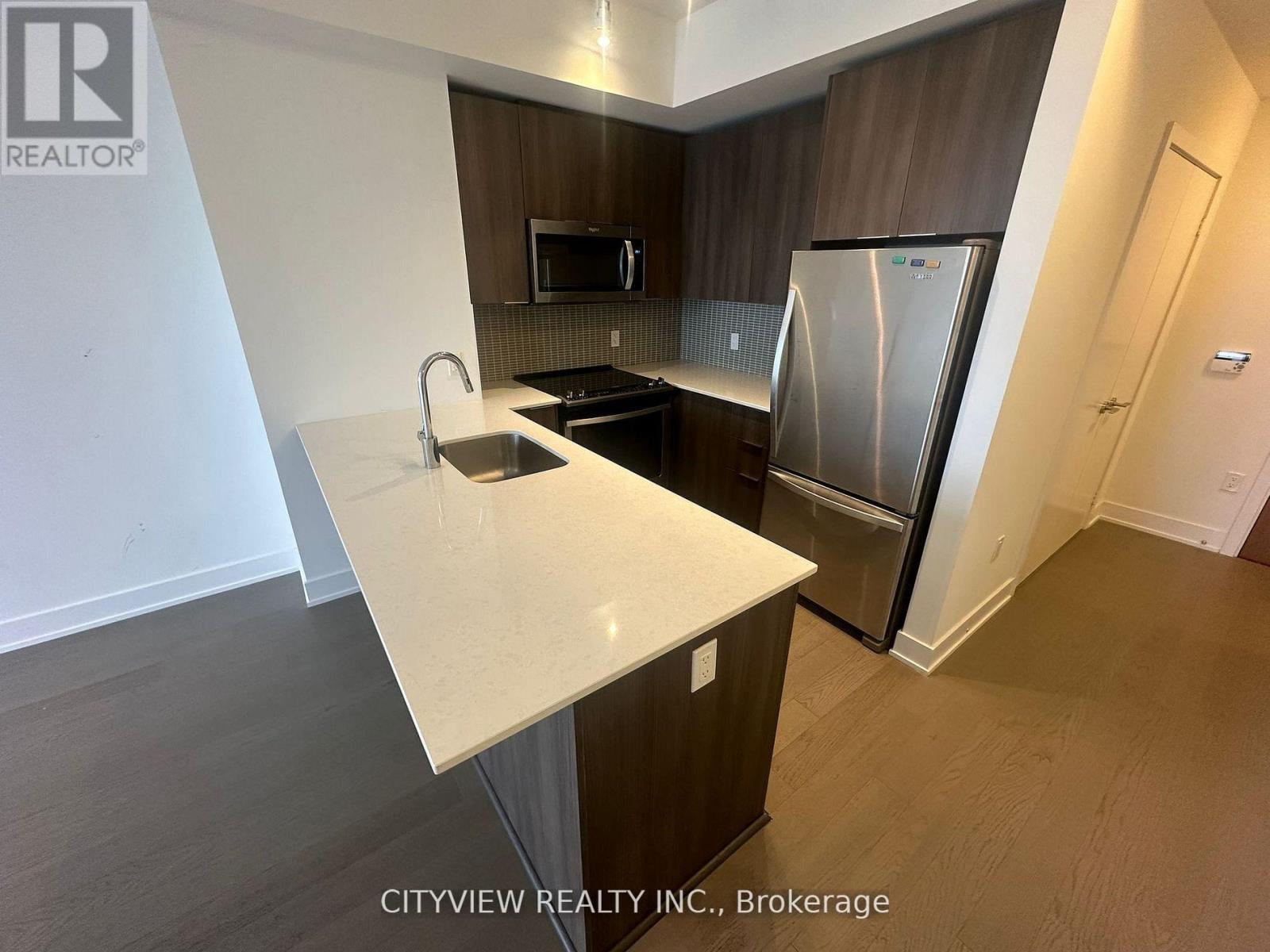3908 - 20 Shore Breeze Drive, Toronto, ON - Indoor Photo Showing Kitchen With Stainless Steel Kitchen