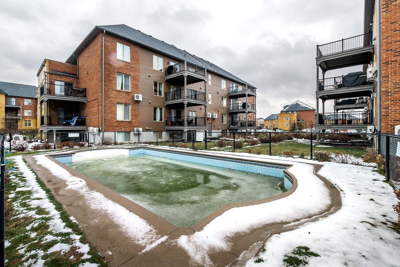 Exterior - 7-6100 Rue De Lusa, Brossard, QC - Outdoor With In Ground Pool