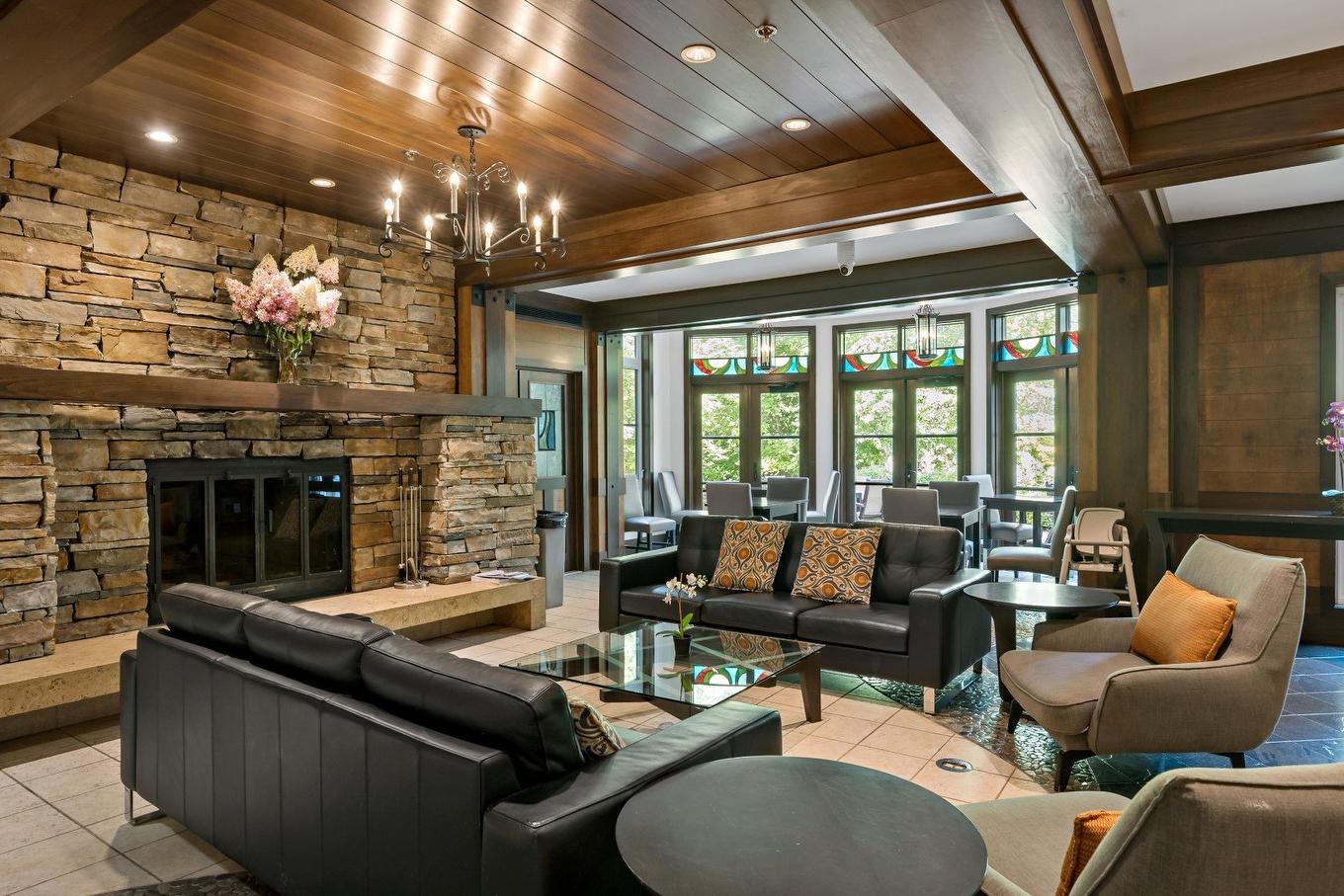 Autre - 21-150 Ch. Du Curé-Deslauriers, Mont-Tremblant, QC - Indoor Photo Showing Living Room With Fireplace