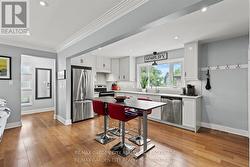 Renovated Kitchen with Quartz Counters & Pantry. -