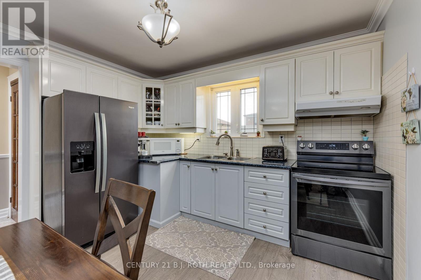 193 Epsom Downs Drive, Toronto, ON - Indoor Photo Showing Kitchen With Double Sink