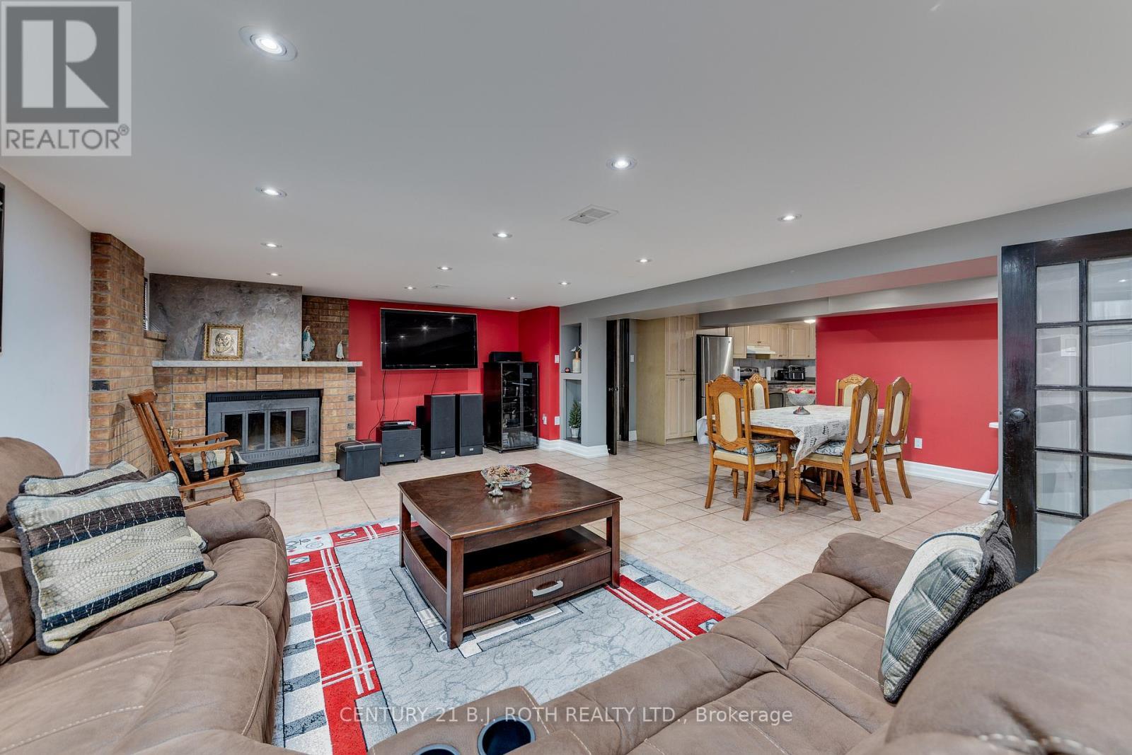 193 Epsom Downs Drive, Toronto, ON - Indoor Photo Showing Living Room With Fireplace