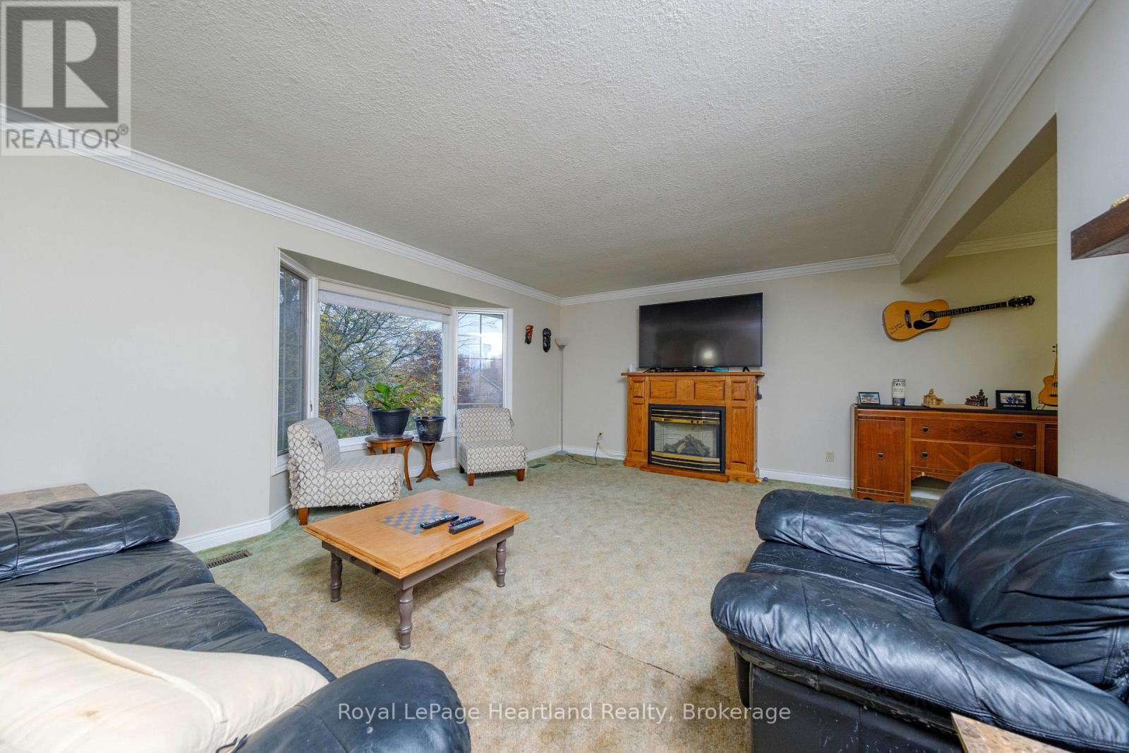 5 Remington Drive, North Huron (Wingham), ON - Indoor Photo Showing Living Room With Fireplace
