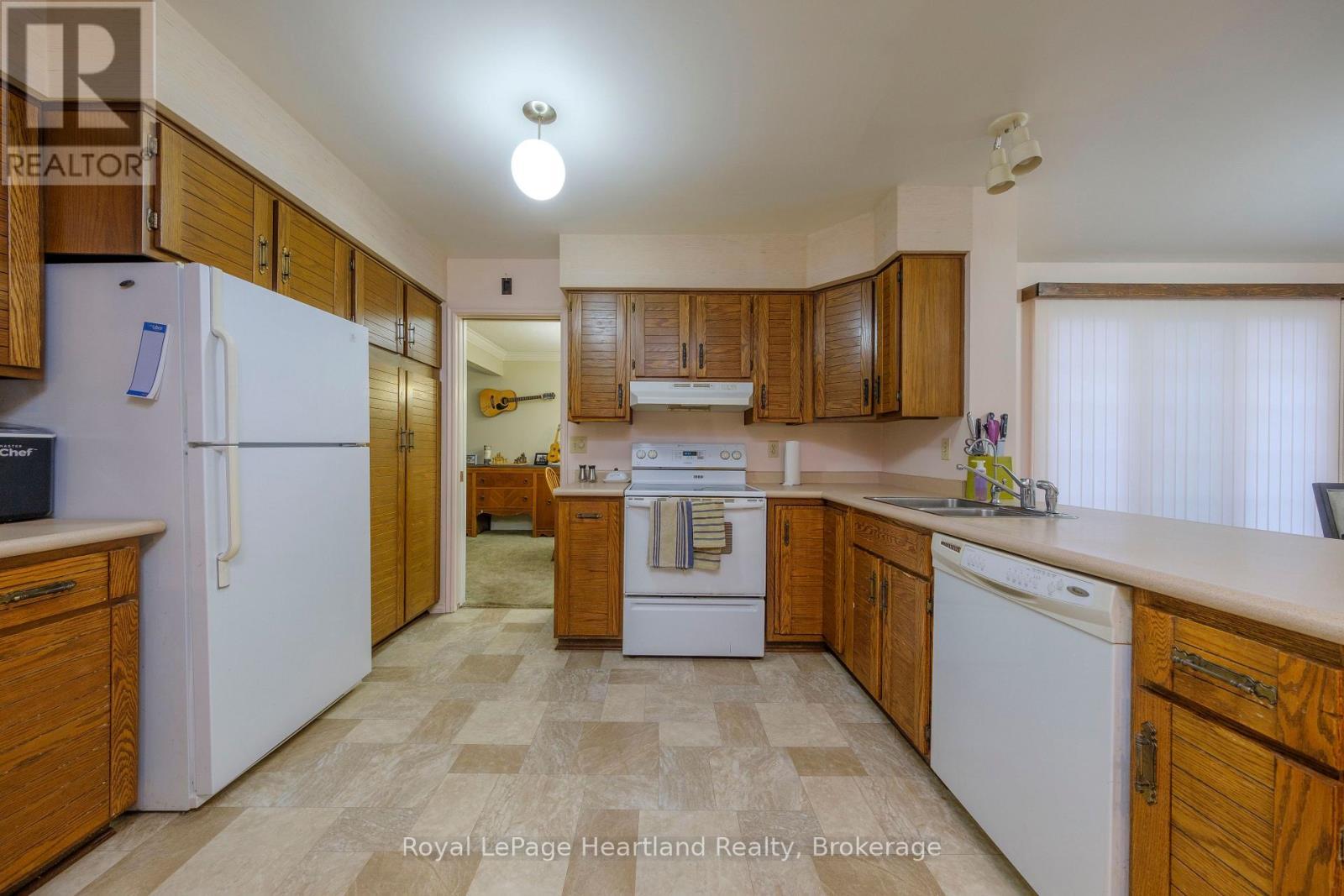 5 Remington Drive, North Huron (Wingham), ON - Indoor Photo Showing Kitchen With Double Sink