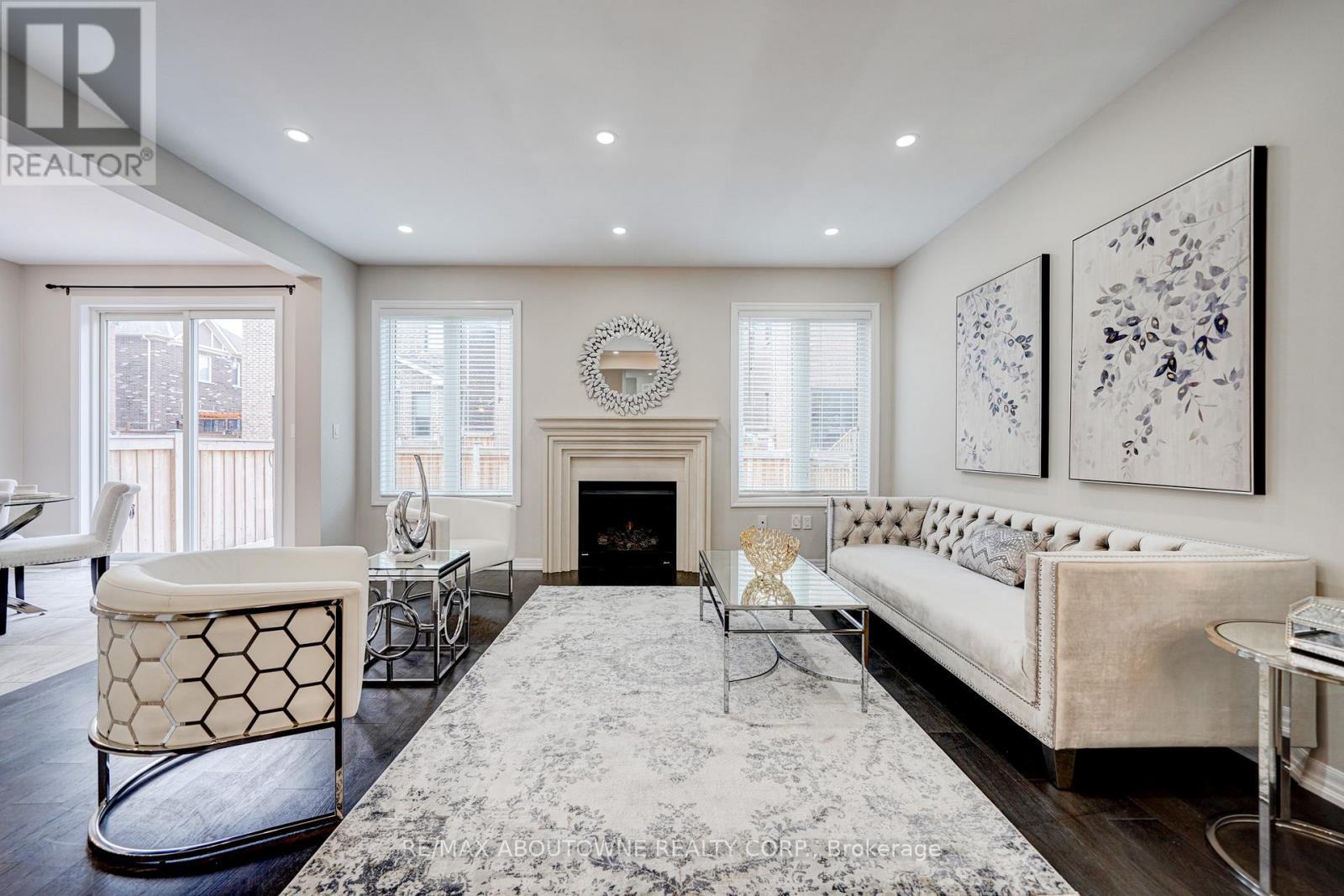 385 Dahlia Trail, Oakville, ON - Indoor Photo Showing Living Room With Fireplace
