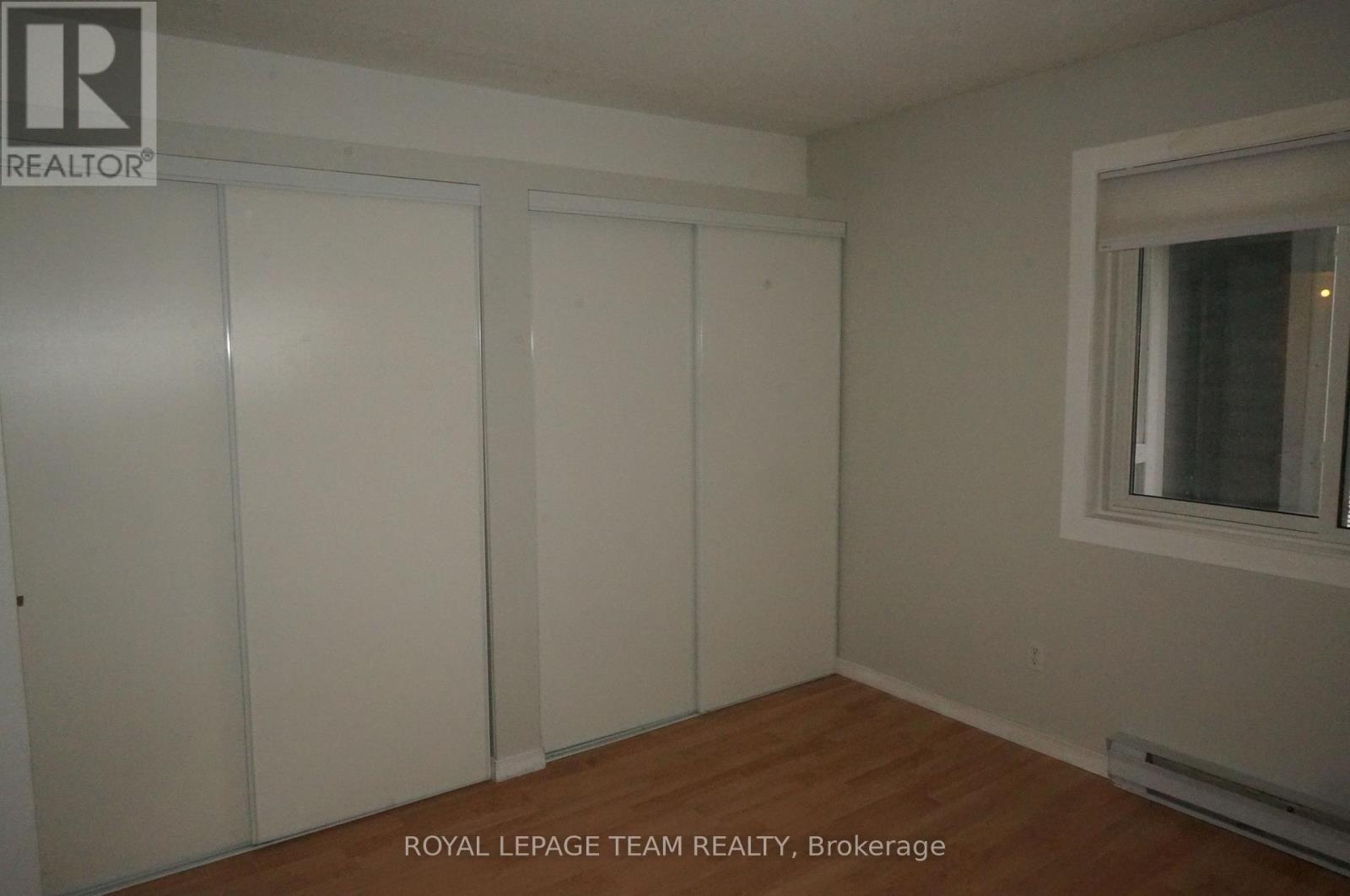2nd Bedroom with 2 large closets and window - 217 - 316 Lorry Greenberg Drive, Ottawa, ON - Indoor Photo Showing Other Room