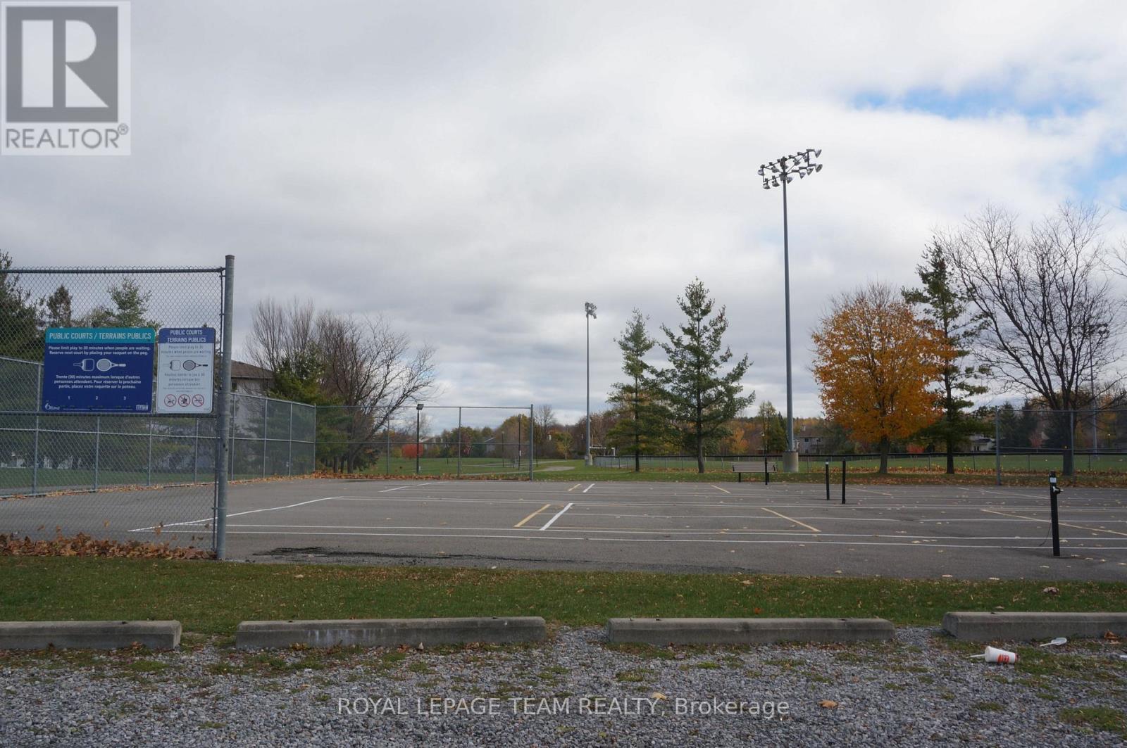 Public tennis courts and baseball diamond - 217 - 316 Lorry Greenberg Drive, Ottawa, ON - Outdoor With View