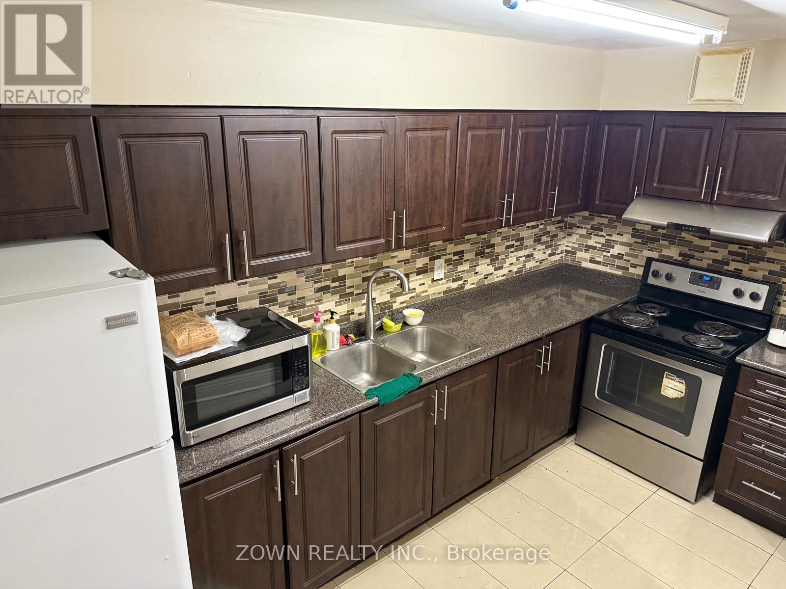 602 - 100 Echo Point, Toronto, ON - Indoor Photo Showing Kitchen With Double Sink