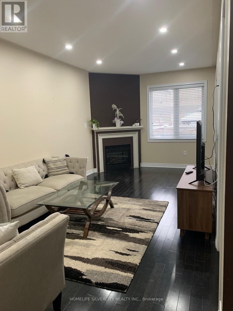5 Almond Street, Brampton, ON - Indoor Photo Showing Other Room With Fireplace