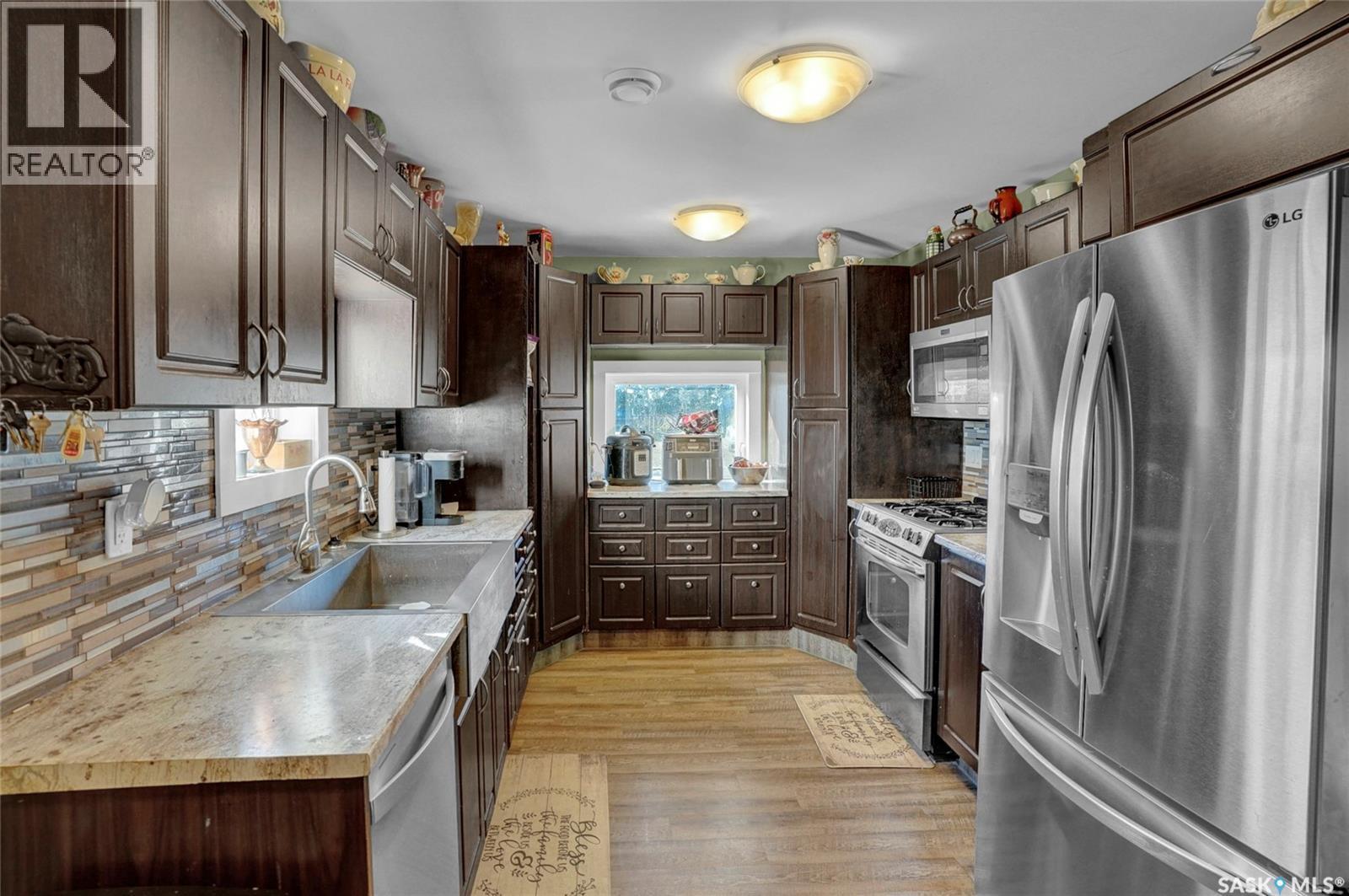 26 Main Street, Marquis, SK - Indoor Photo Showing Kitchen With Double Sink