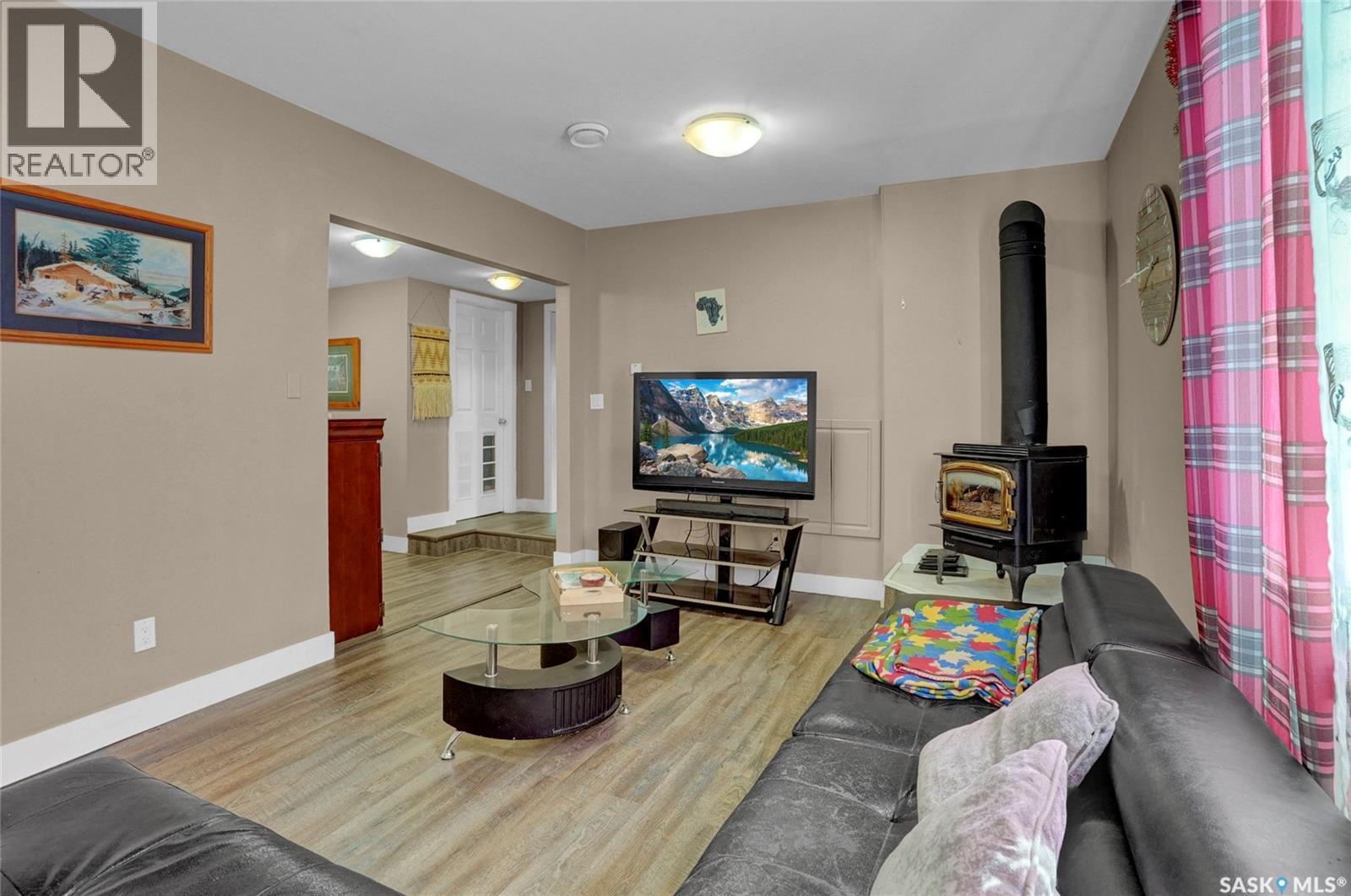 26 Main Street, Marquis, SK - Indoor Photo Showing Living Room With Fireplace