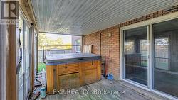 Covered back deck - access from lower level -