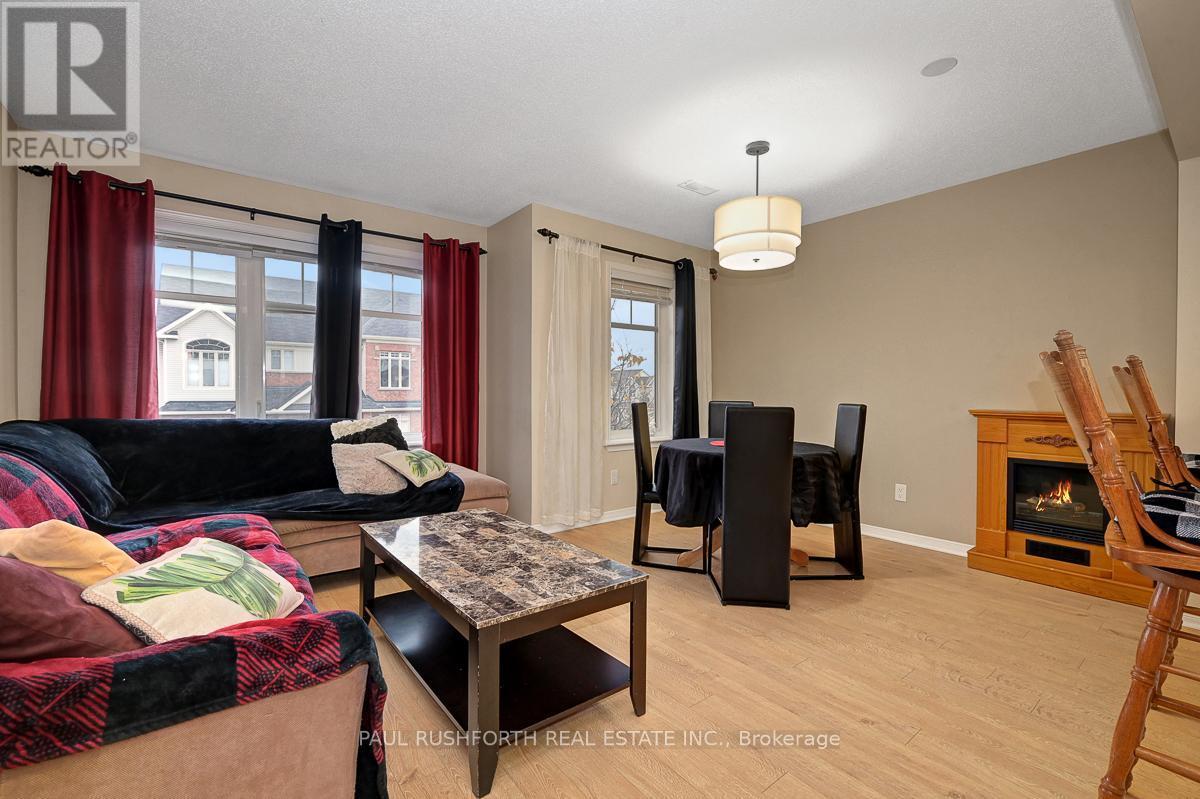 Living Area - 117 Keltie Private, Ottawa, ON - Indoor Photo Showing Living Room With Fireplace