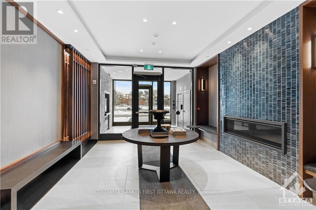 605 - 115 Echo Drive, Ottawa, ON - Indoor Photo Showing Other Room With Fireplace