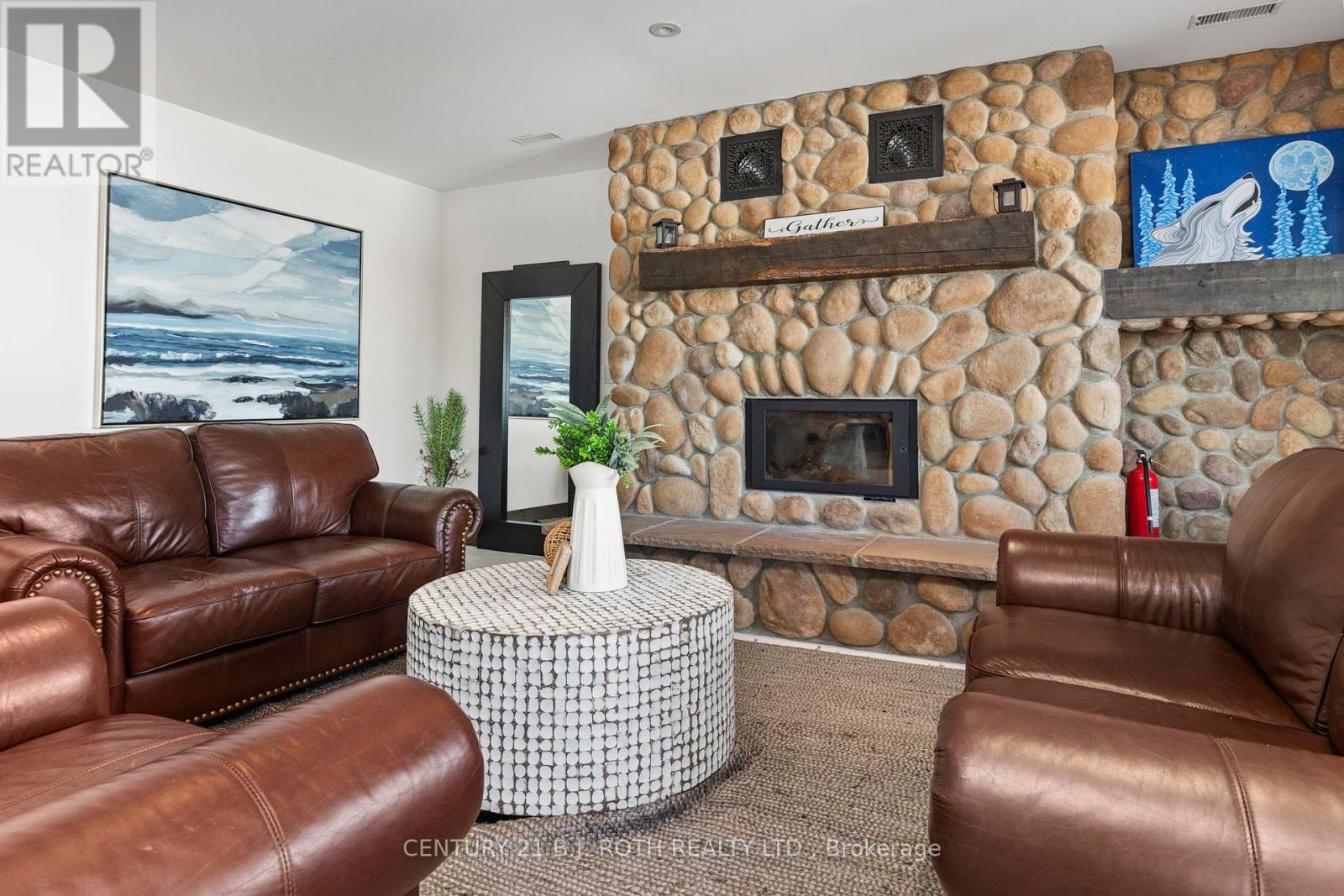 64 Mccords Road, Mckellar, ON - Indoor Photo Showing Living Room With Fireplace